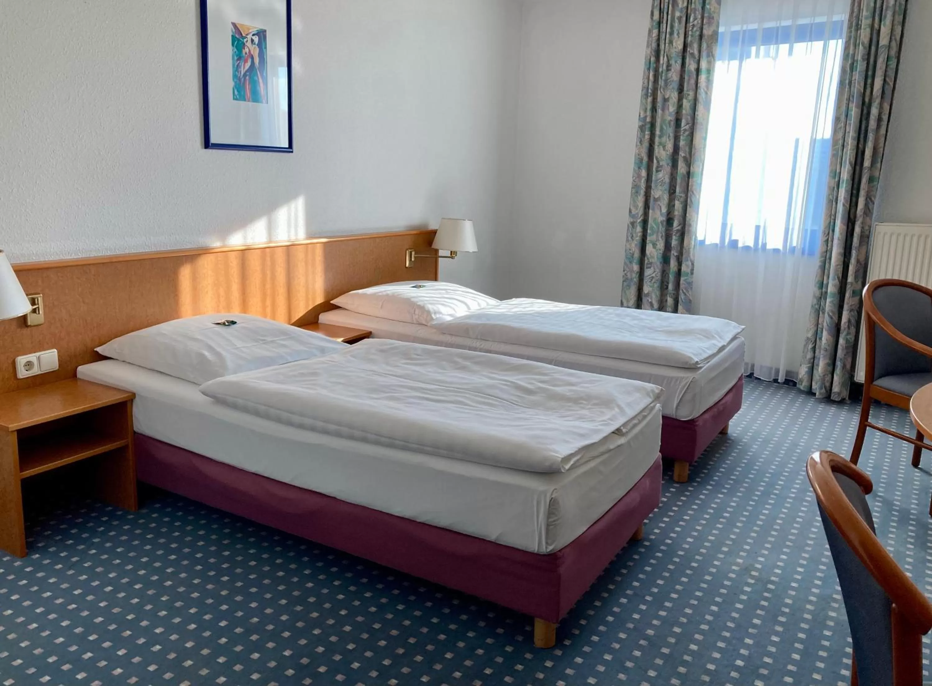 Photo of the whole room, Bed in Akzent Congresshotel Hoyerswerda