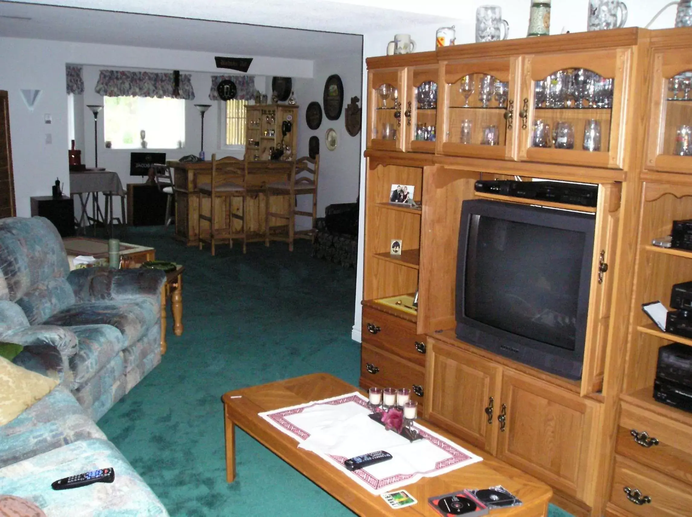 Living room, TV/Entertainment Center in Tucked Inn the Harbour B&B