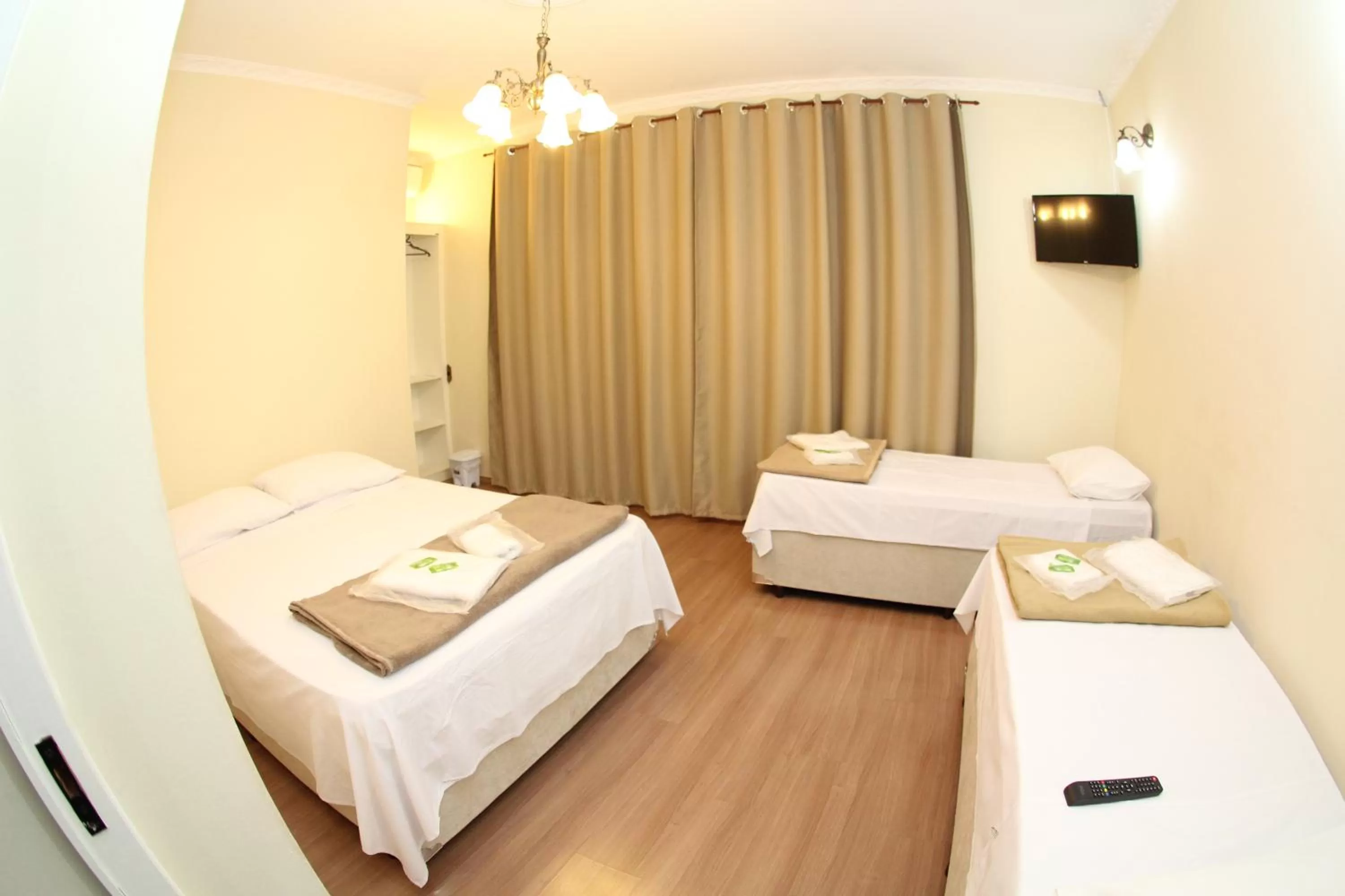 Bed in Pousada Santa Genebra