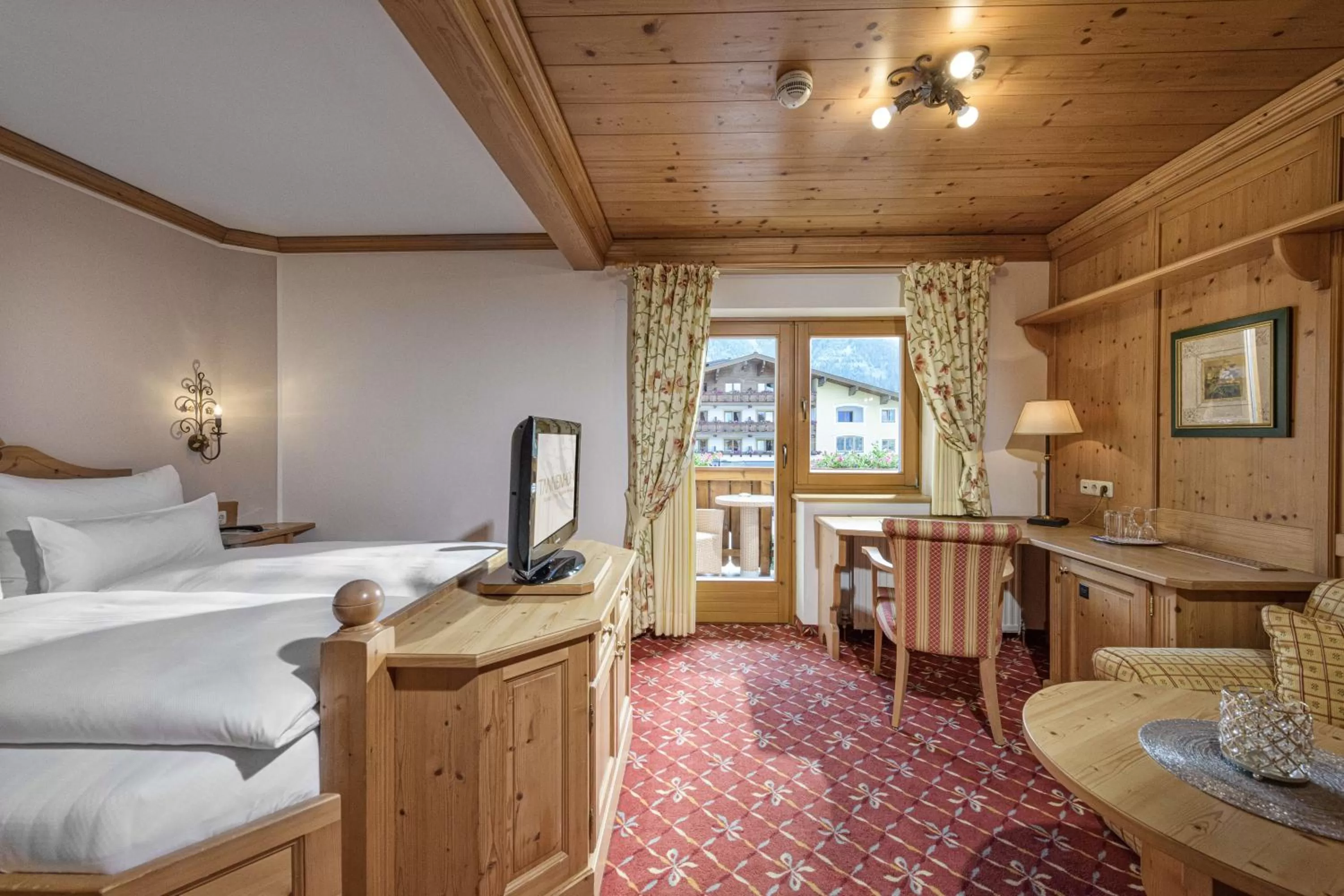 Photo of the whole room, Bed in Alpines Lifestyle Hotel Tannenhof