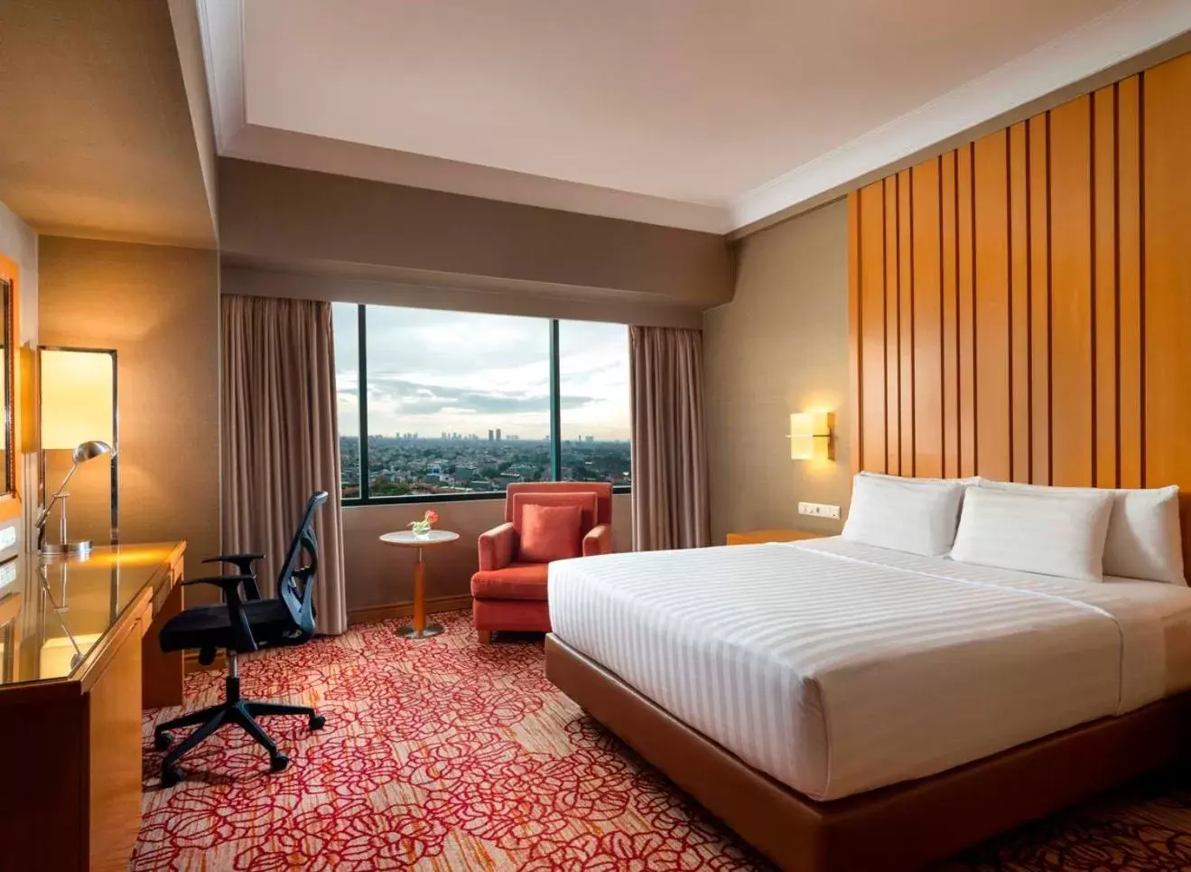 Bedroom in Hotel Ciputra Jakarta managed by Swiss-Belhotel International