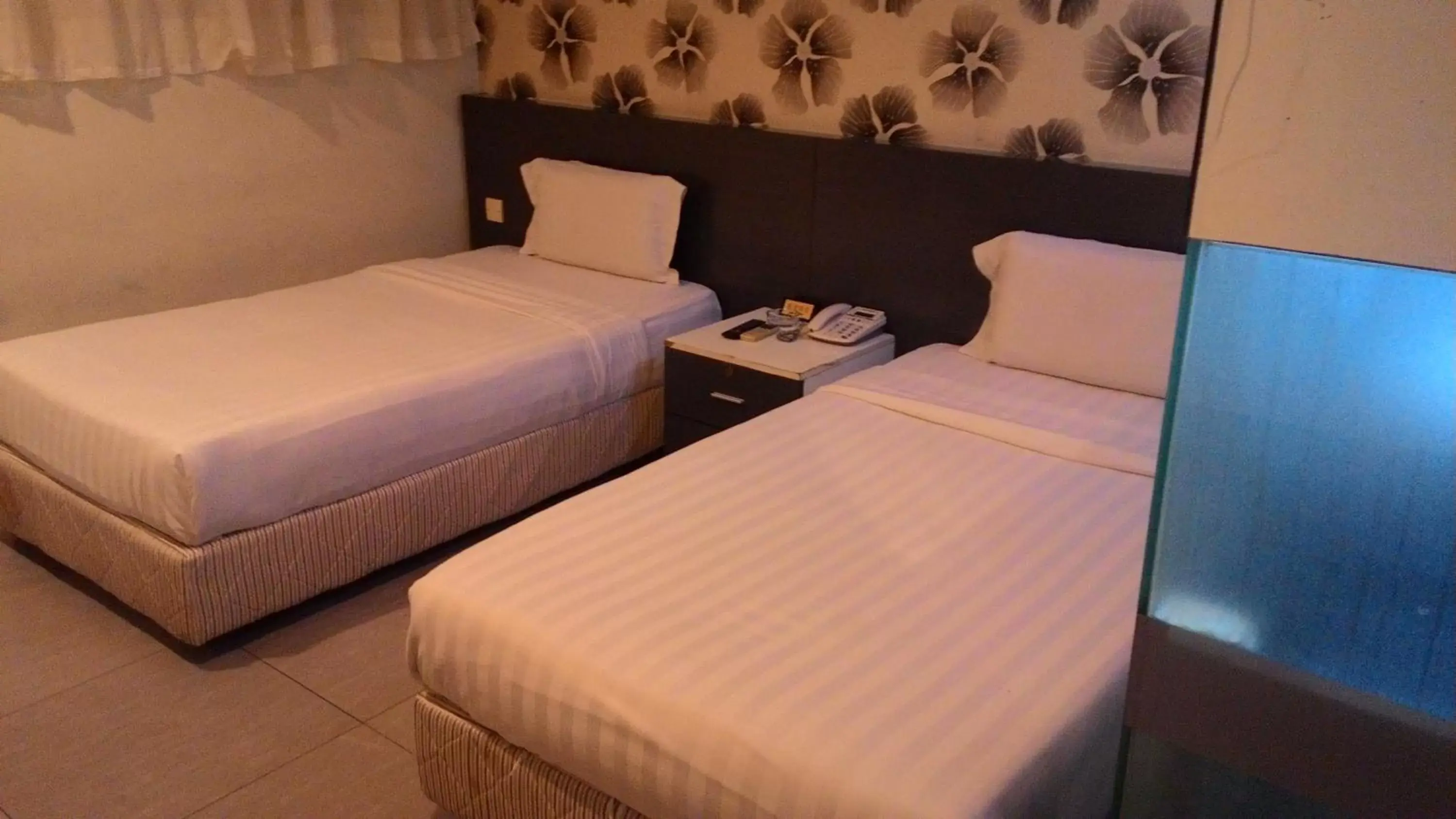 Bed in Prince Hotel