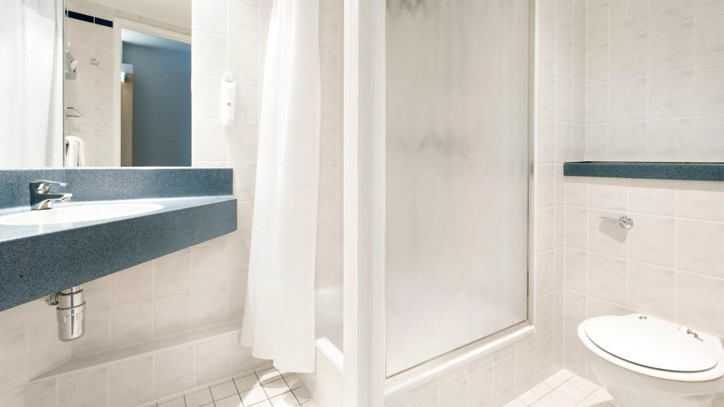 Shower, Bathroom in Holiday Inn Express London Limehouse, an IHG Hotel