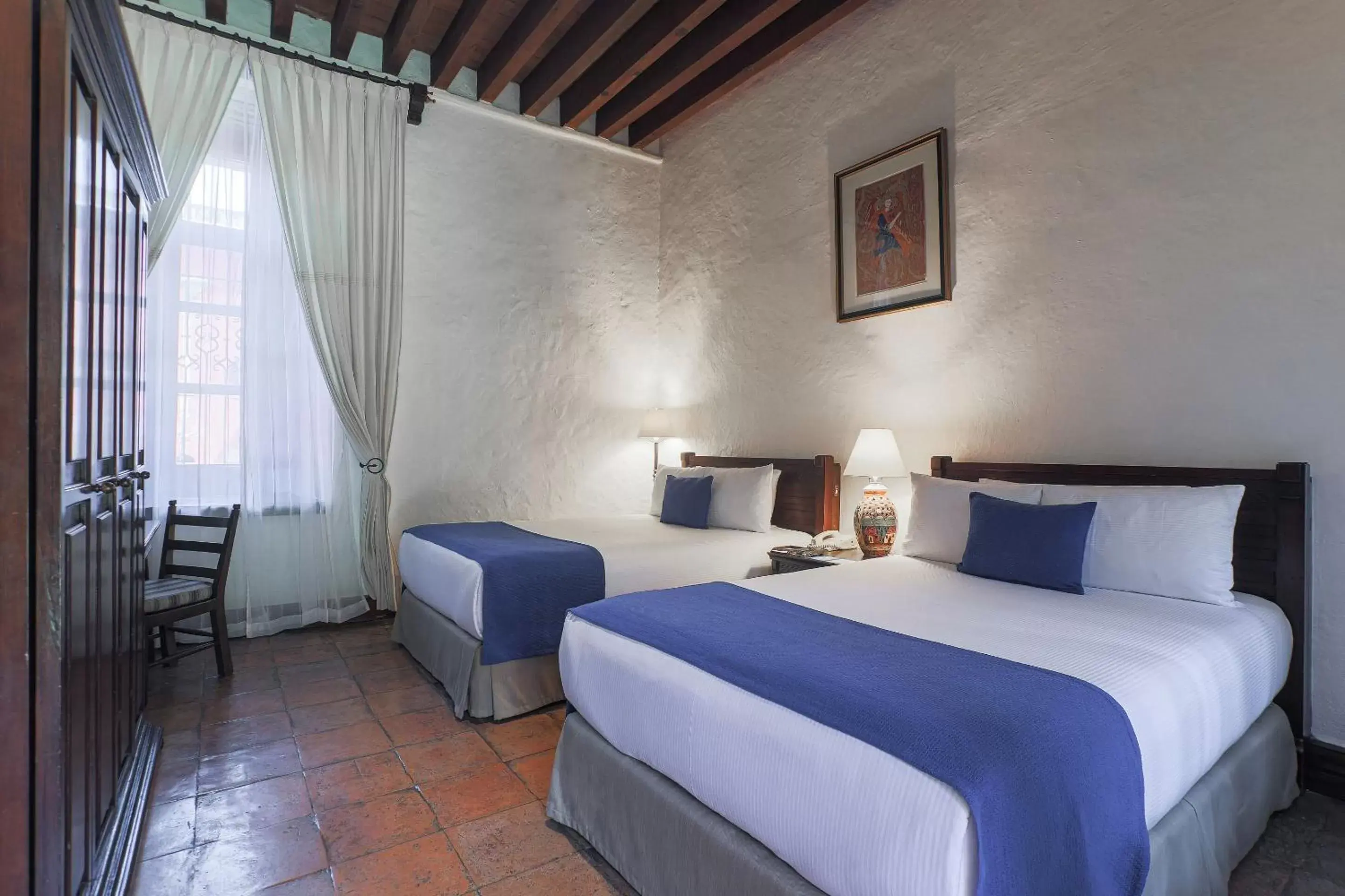 Photo of the whole room, Bed in Quinta Real Oaxaca