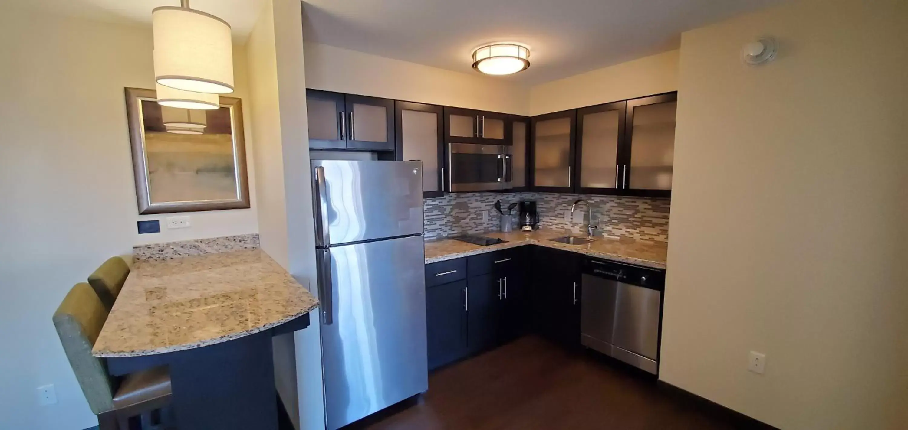 Photo of the whole room, Kitchen/Kitchenette in Staybridge Suites Eau Claire - Altoona, an IHG Hotel