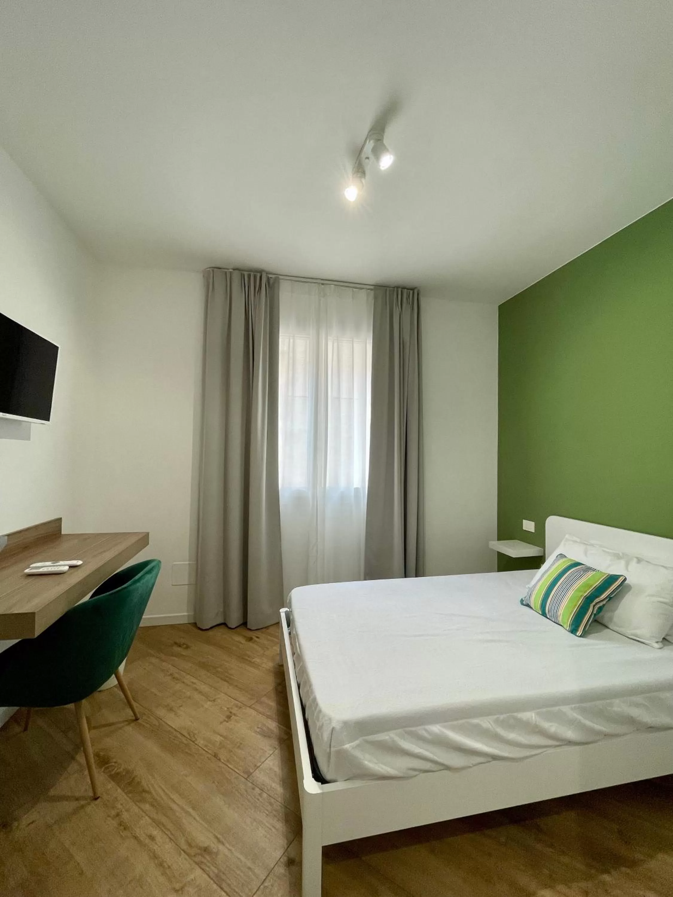 Bed in ALBARIA ROOMS-APARTMENTS