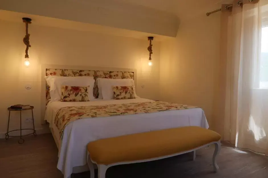 Bedroom in Hotel Casa Palmela - Small Luxury Hotels of The World, Hotel & Villas