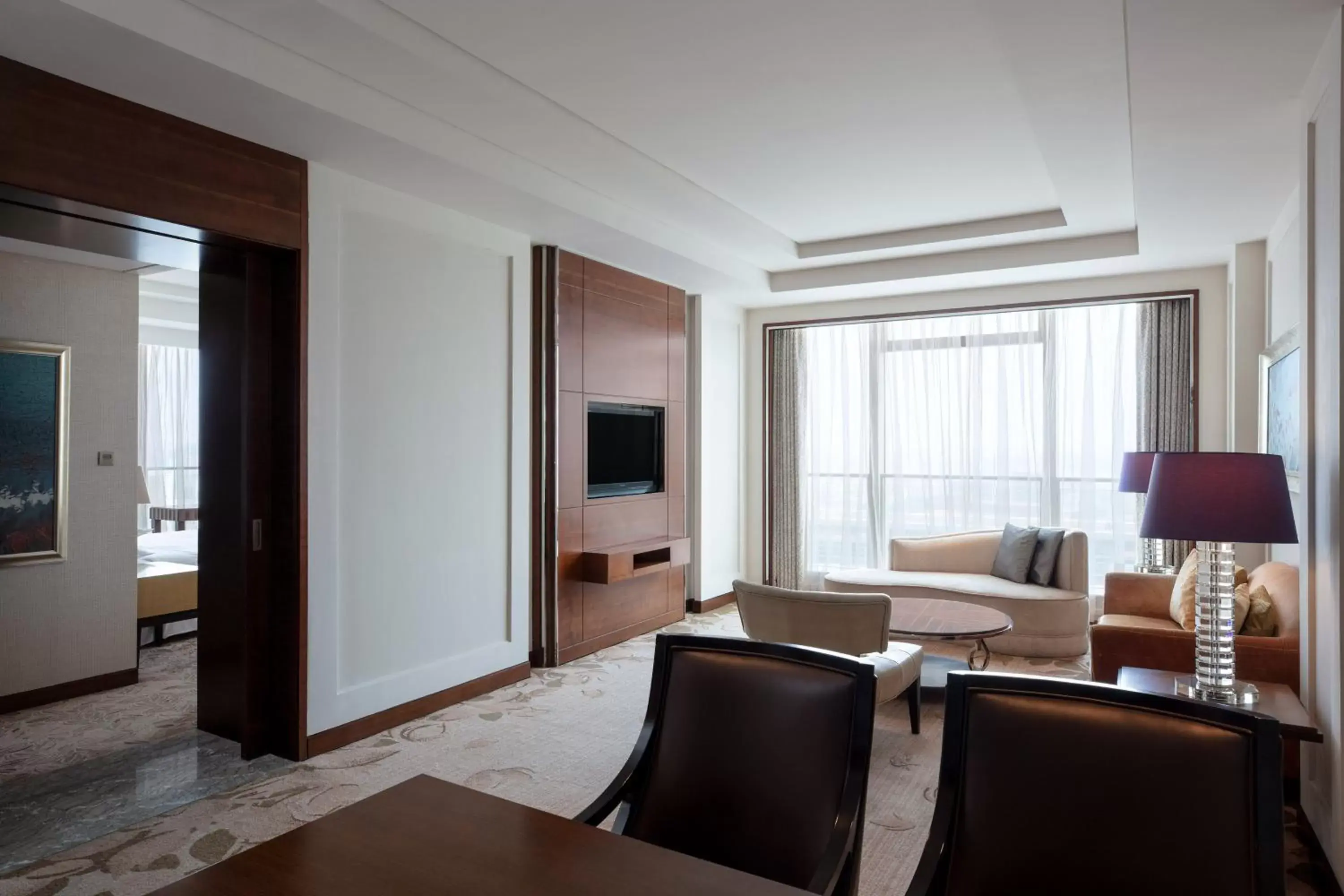 Living room, Seating Area in Sheraton Qingdao Jiaozhou Hotel