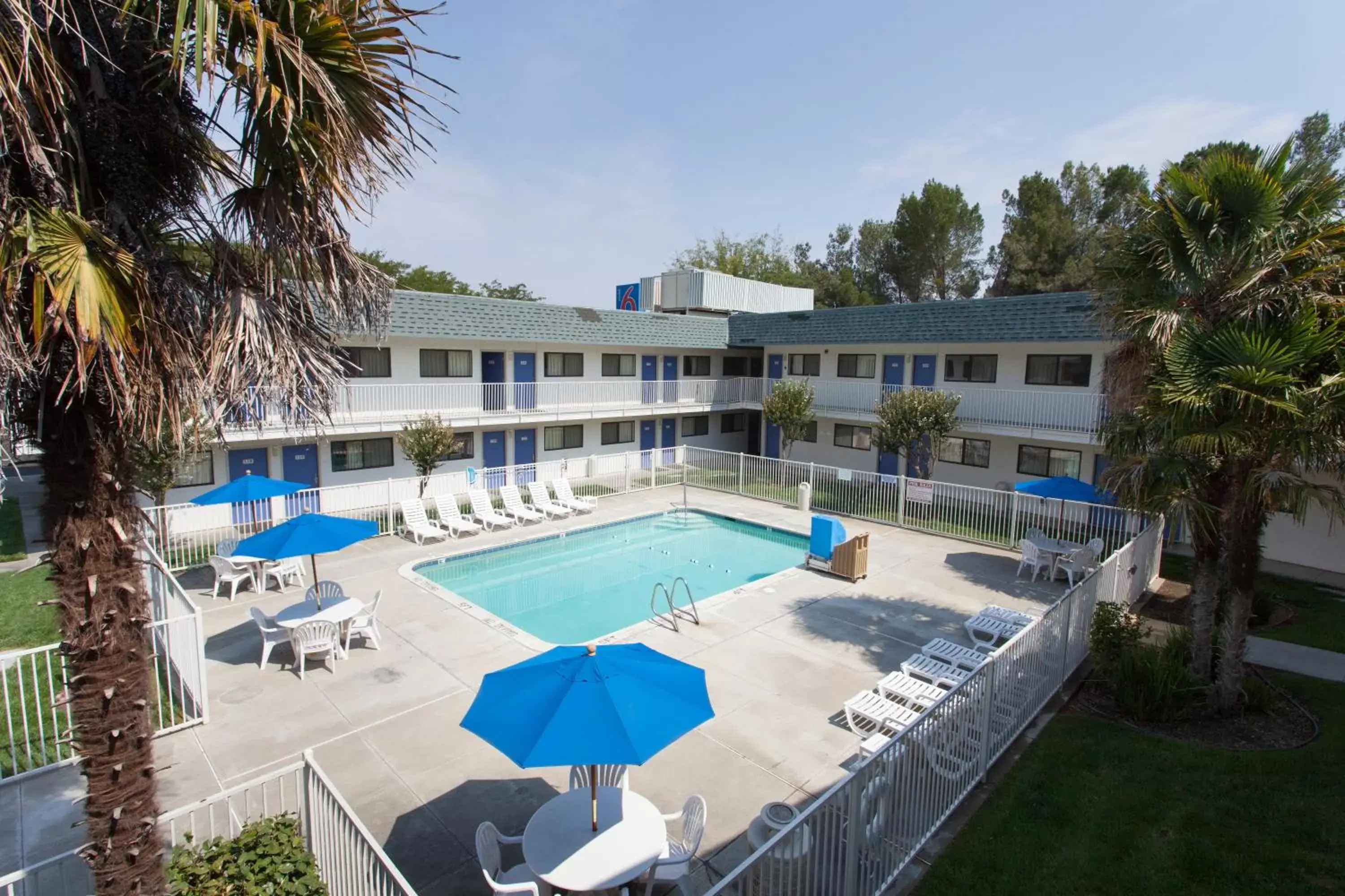 Facade/entrance, Pool View in Motel 6 Davis-Near UC Davis