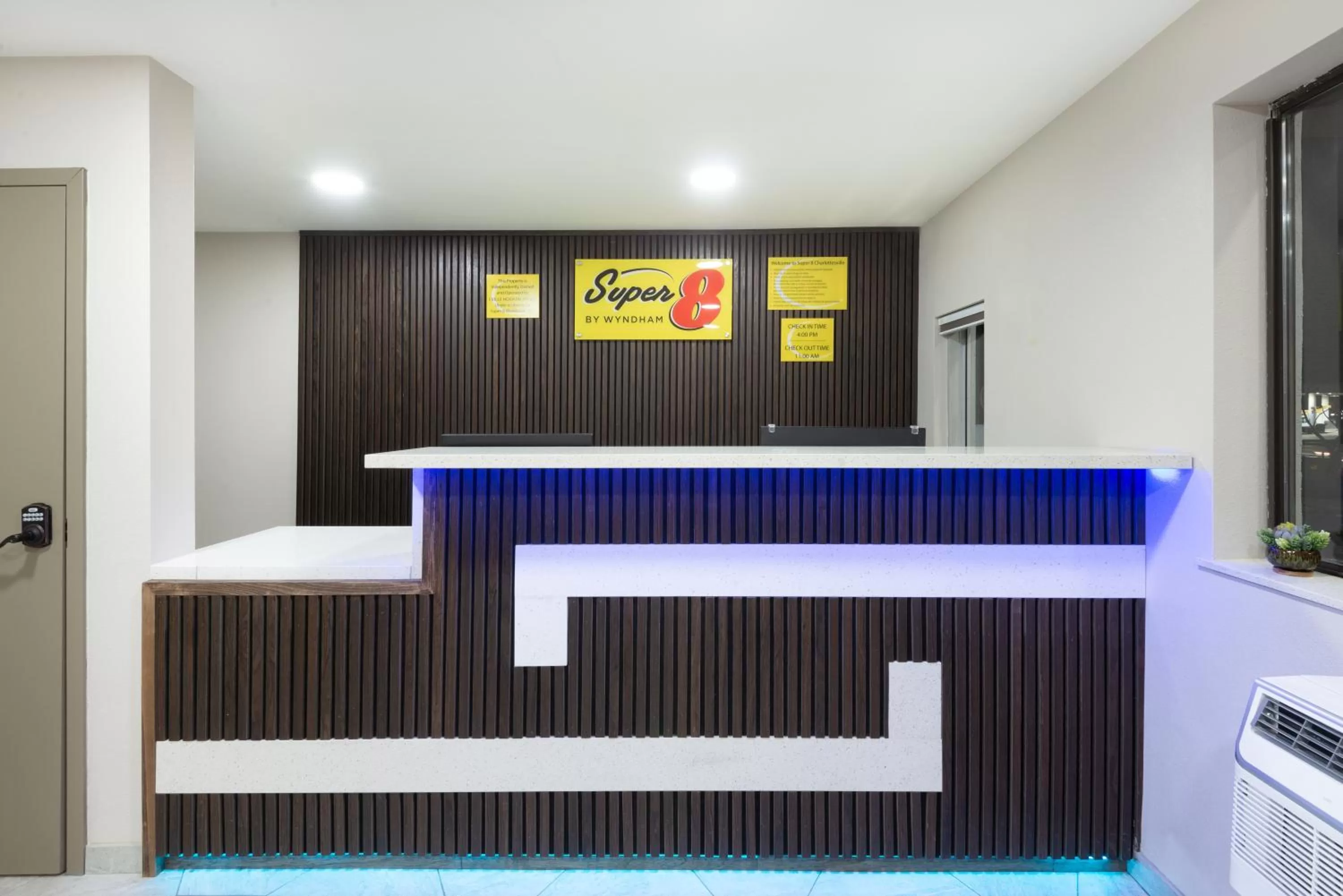 Property logo or sign in Super 8 by Wyndham Charlottesville