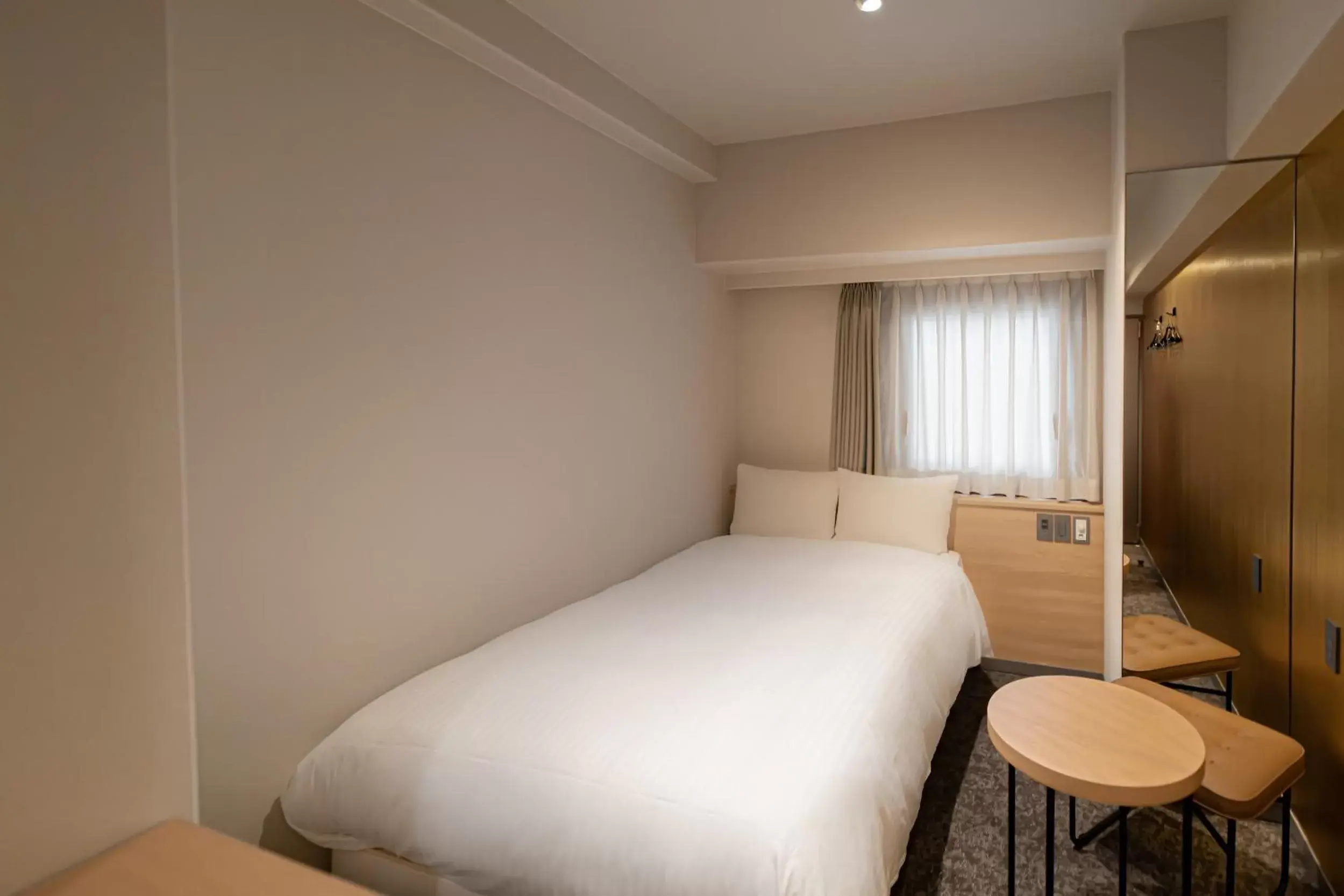 Photo of the whole room, Bed in EN HOTEL Hakata