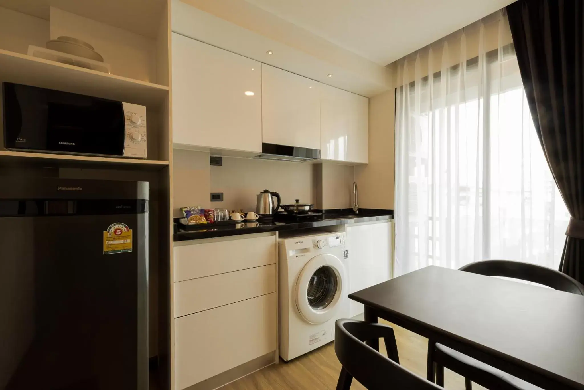 Kitchen or kitchenette in Zensation The Residence Kitchen or kitchenette in Zensation The Residence