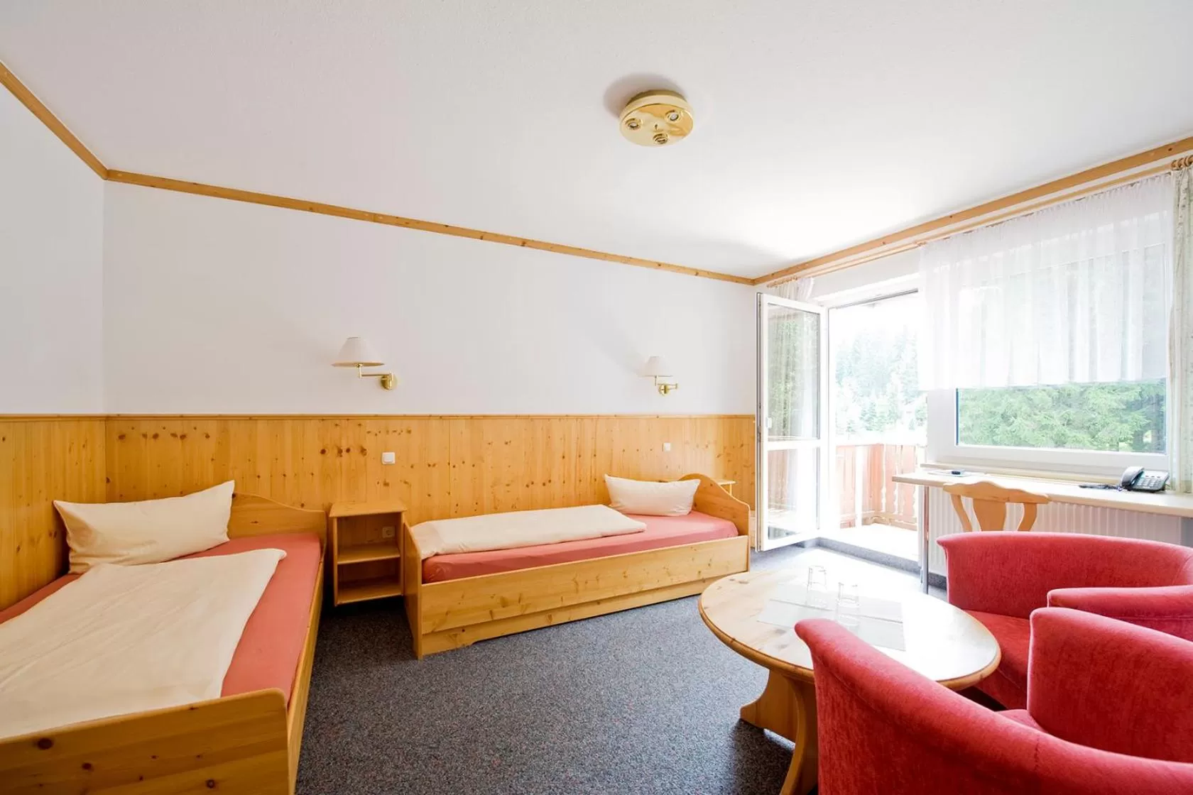 Living room, Bed in Sportpark Rabenberg