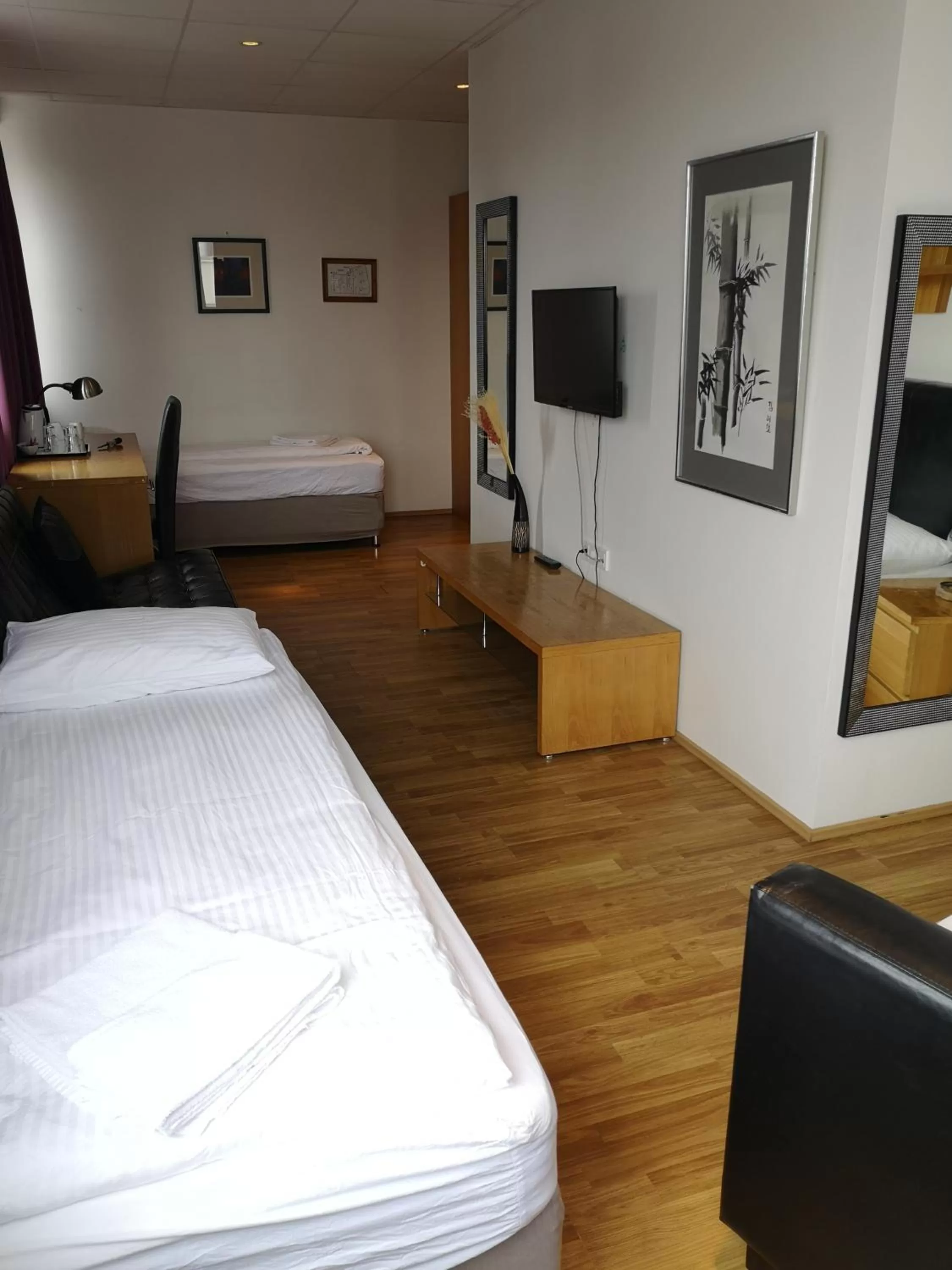 Bed in 101 Guesthouse Hotel