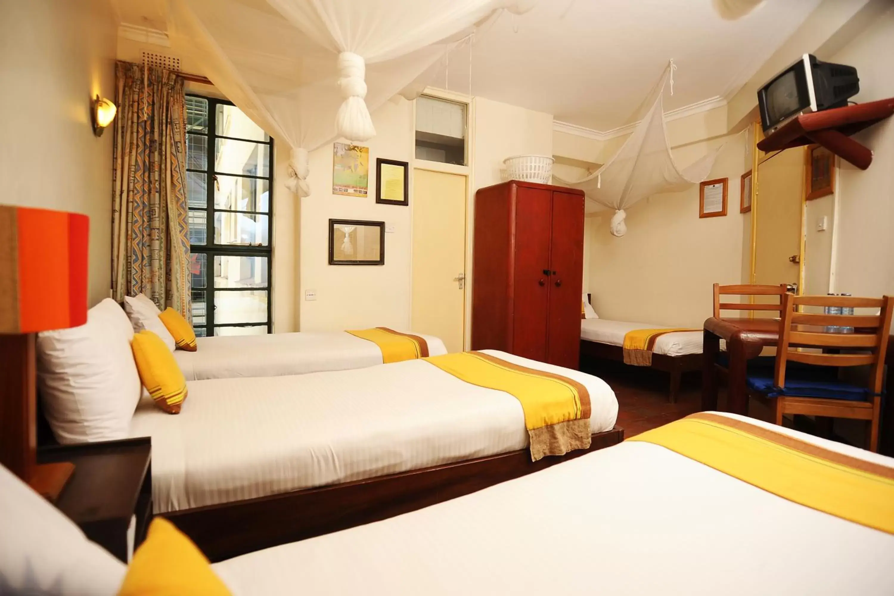 Photo of the whole room, Bed in Kenya Comfort Hotel