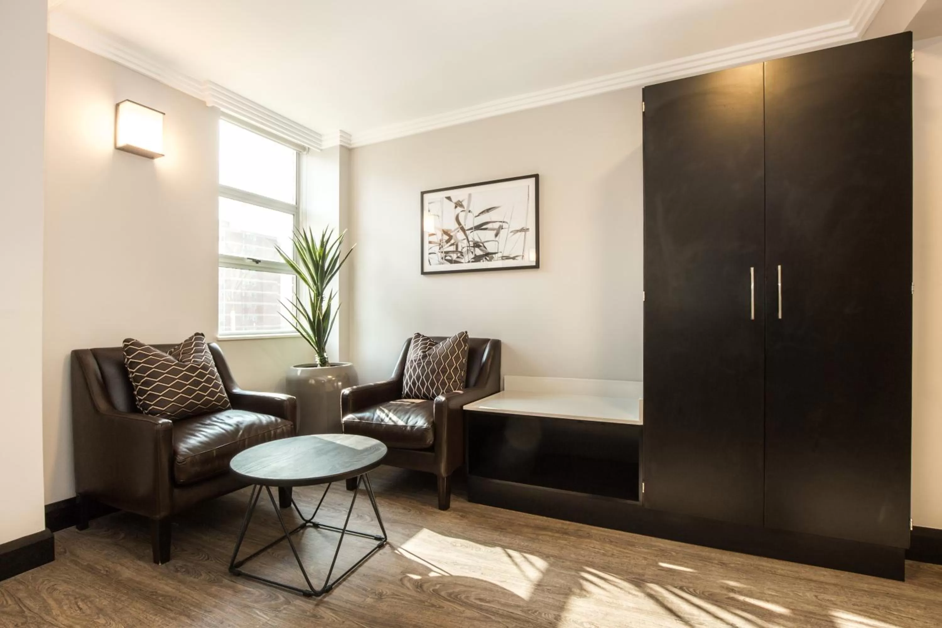 Seating area in Belaire Suites Hotel