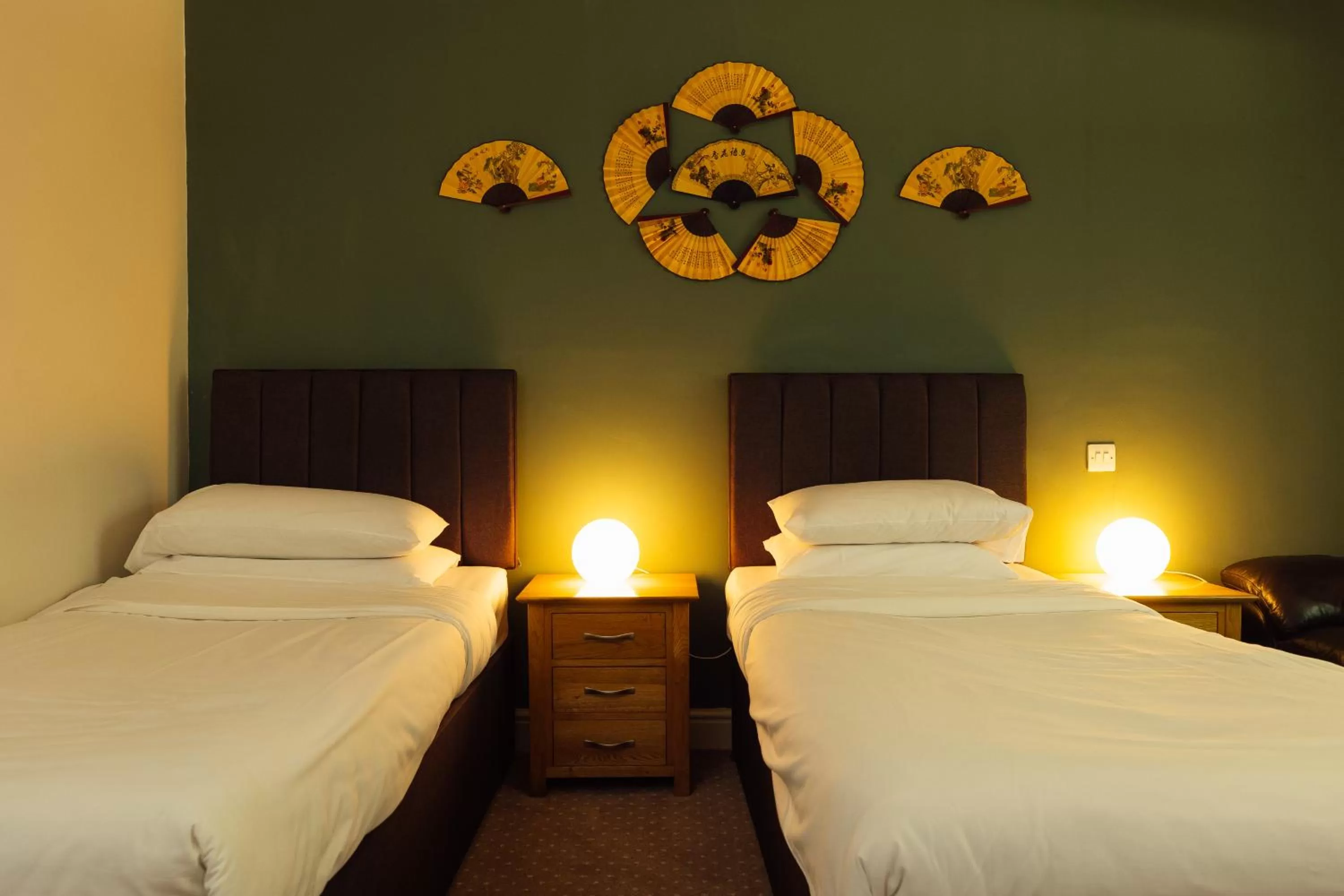 Bed in The Imperial Dragon Hotel