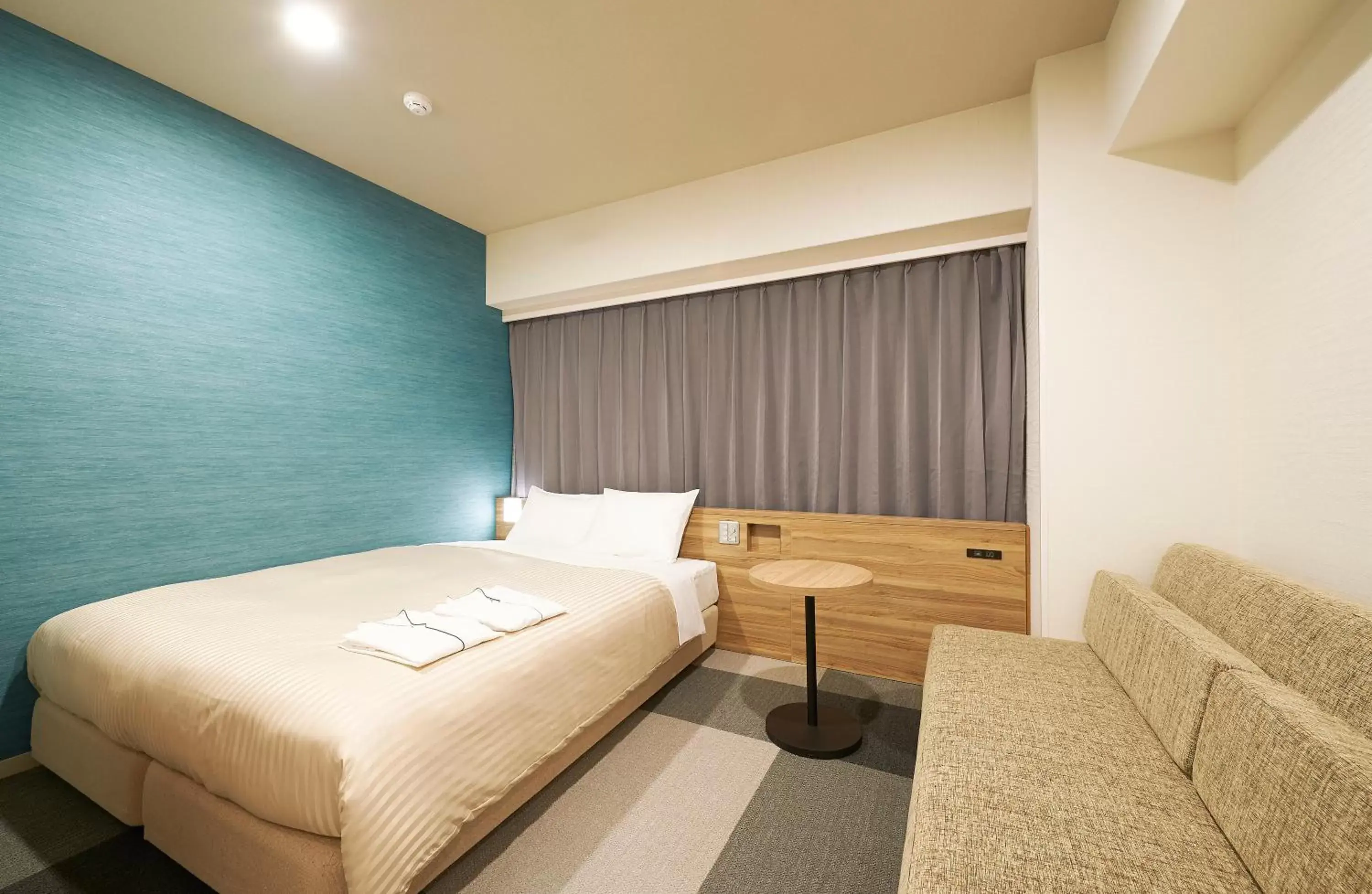 Bed in Sotetsu Fresa Inn Osaka Shinsaibashi Bed in Sotetsu Fresa Inn Osaka Shinsaibashi