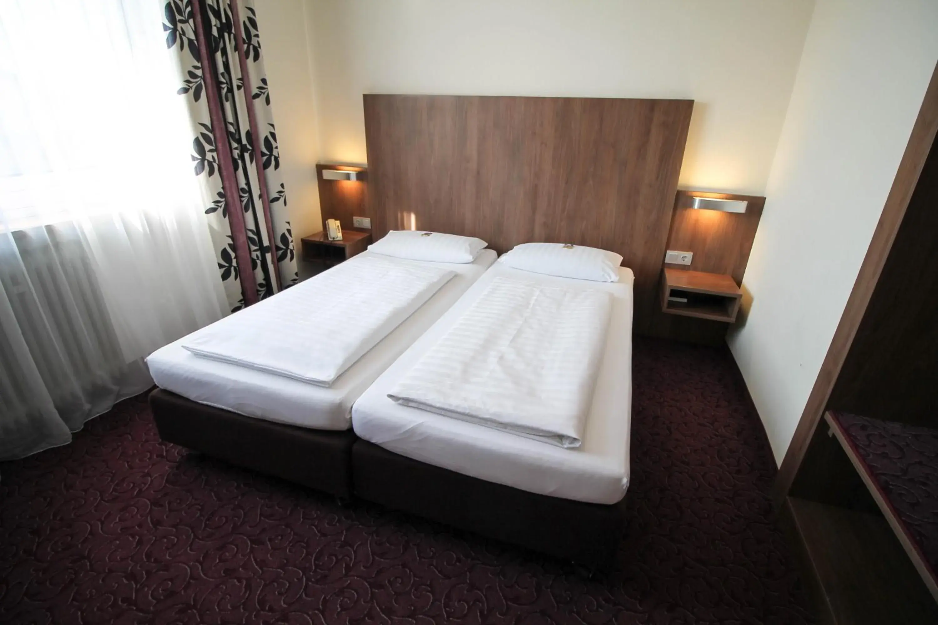 Bed in Hotel am Zoo
