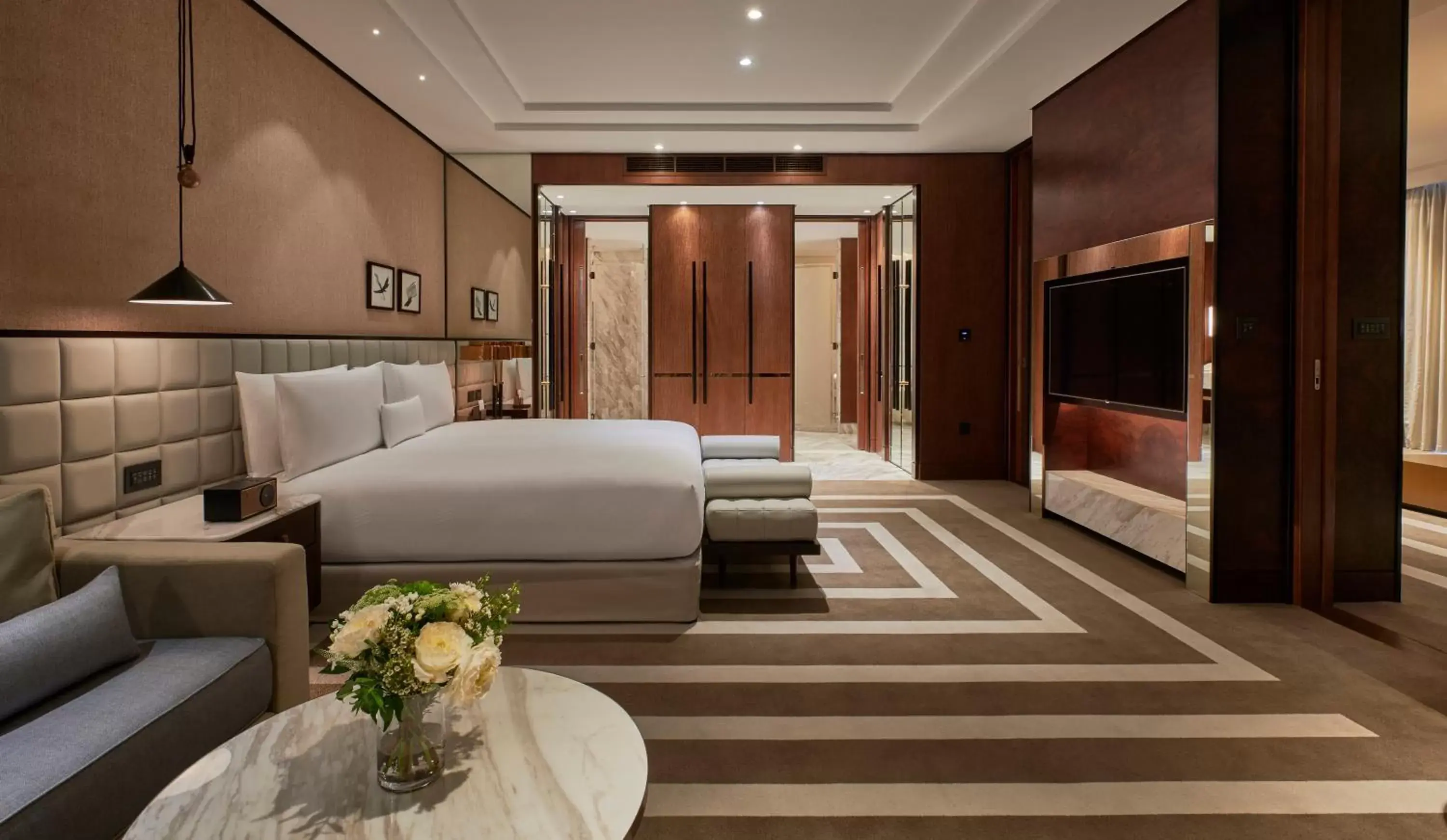 Bed, Seating Area in Waldorf Astoria Dubai International Financial Centre