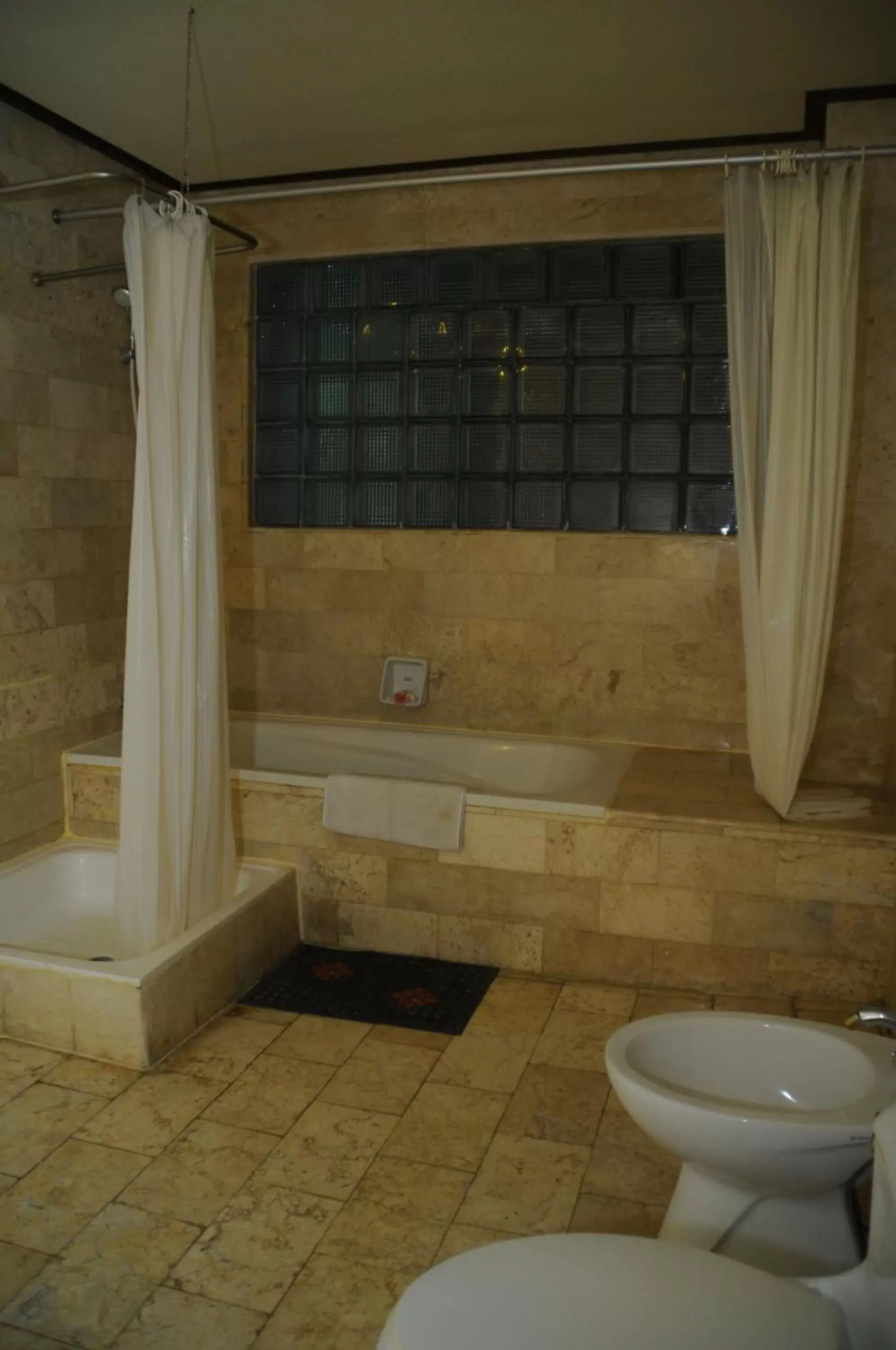 Shower, Bathroom in Melasti Beach Resort & Spa Legian