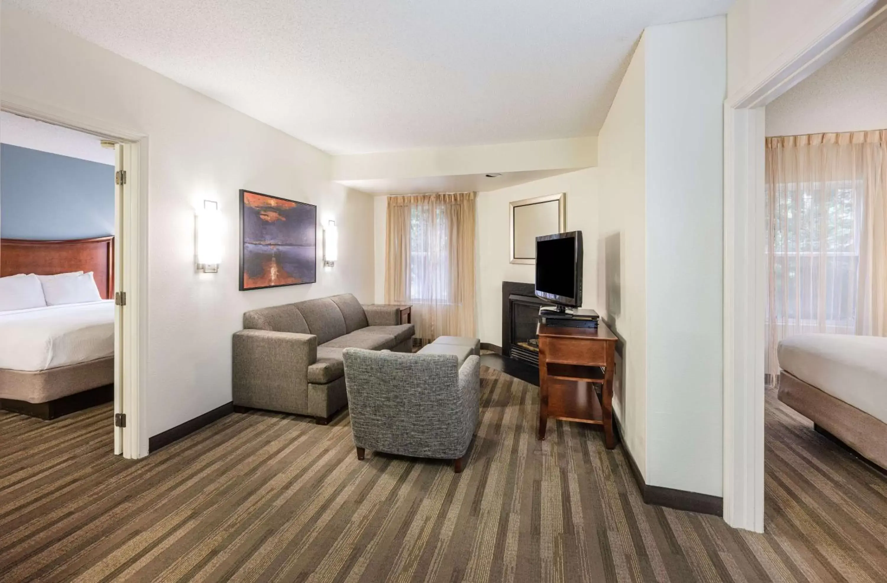 Photo of the whole room, Seating Area in Hyatt House Herndon/Reston