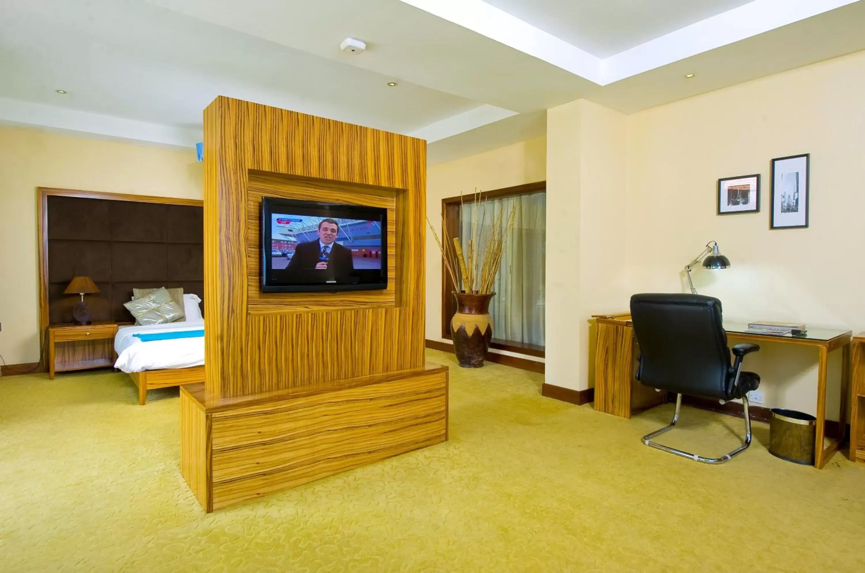 Photo of the whole room, TV/Entertainment Center in Urban by CityBlue Kigali