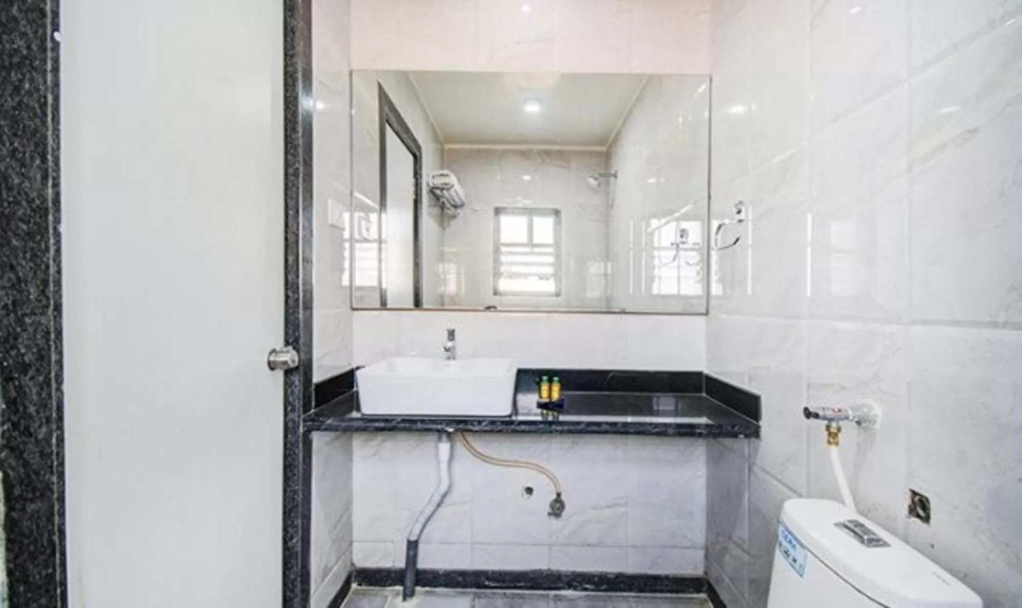 Bathroom in FabHotel Krishna Regency
