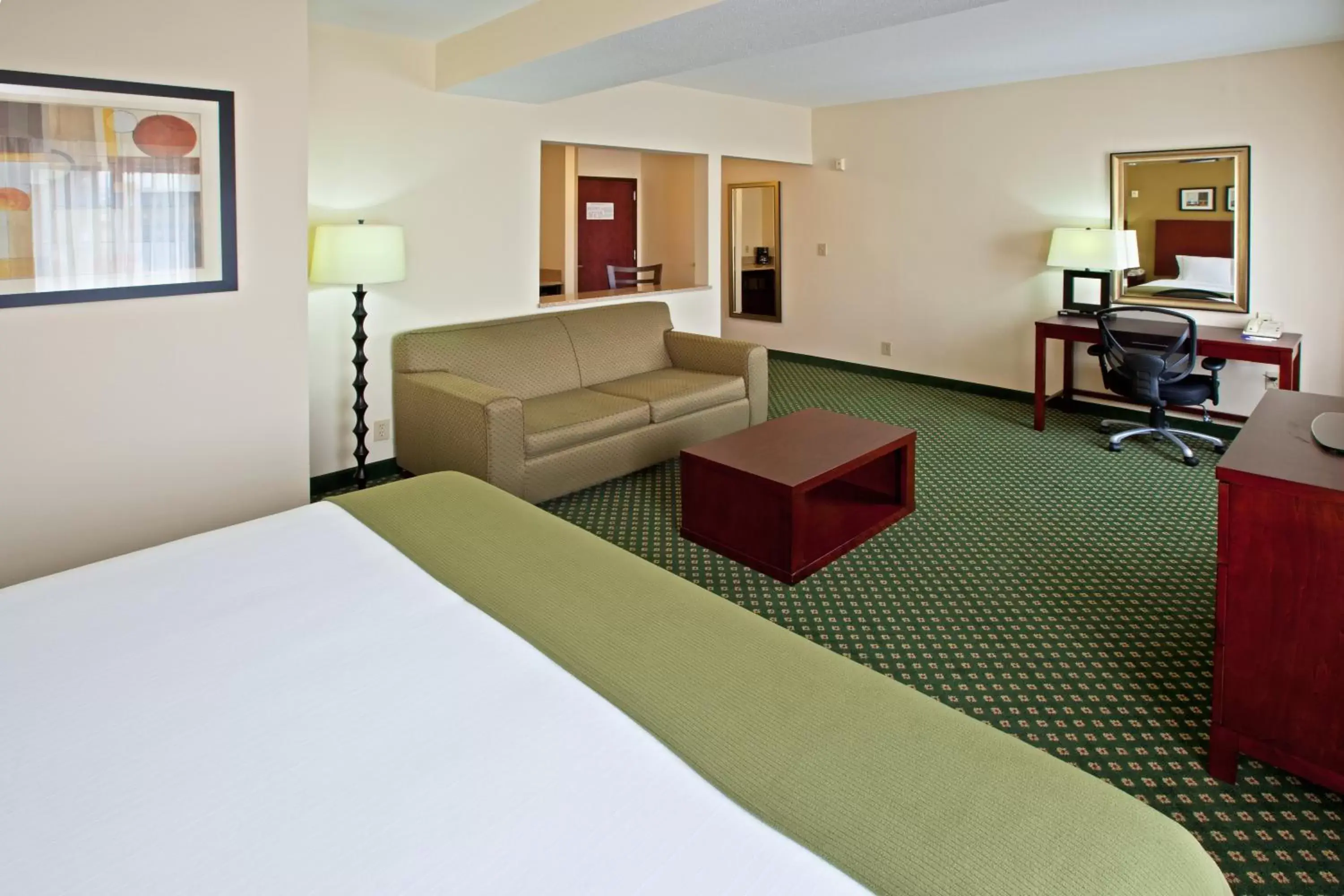 Bedroom, Seating Area in Holiday Inn Express Hotel & Suites Indianapolis - East, an IHG Hotel