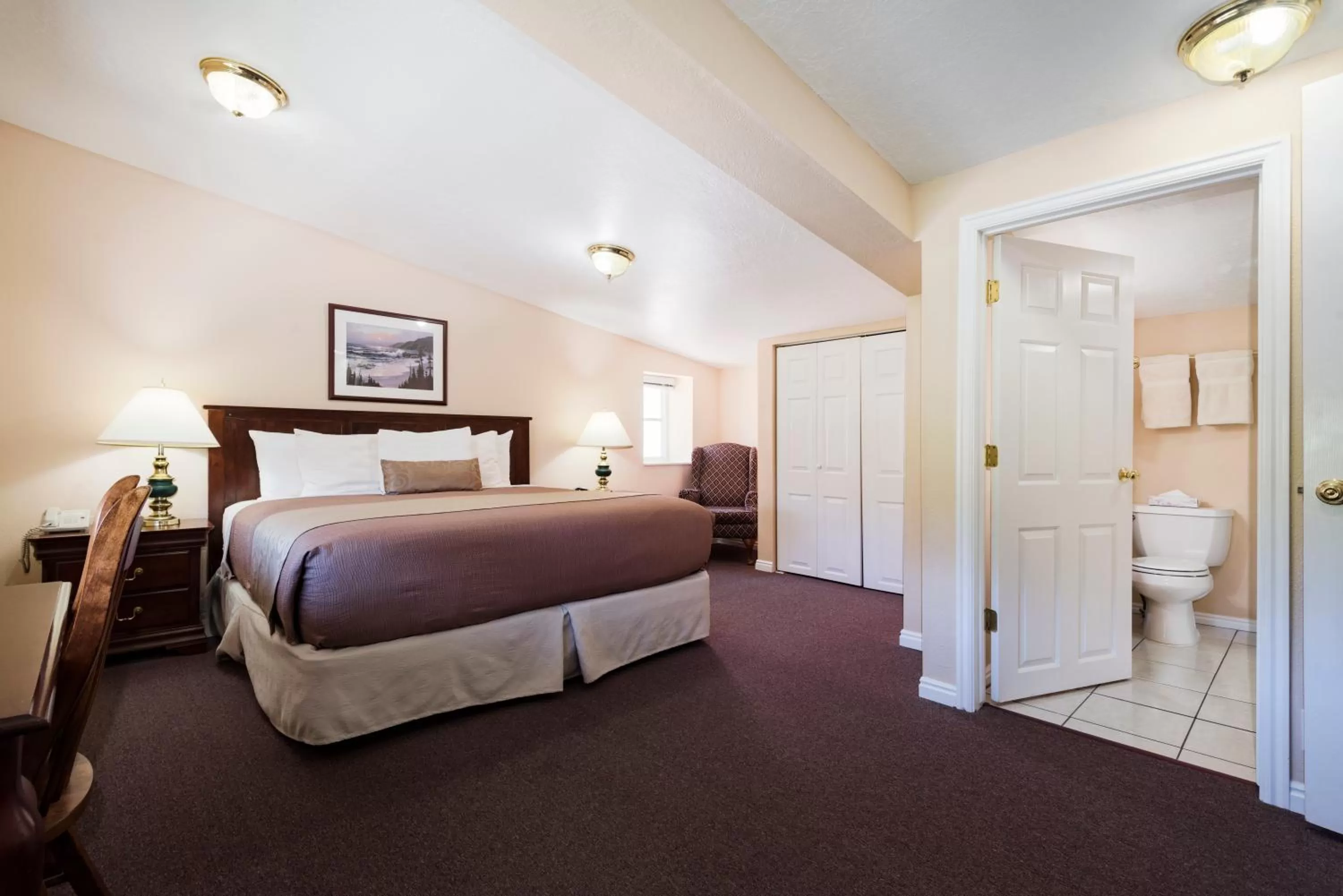 Bed in The Kimball at Temple Square