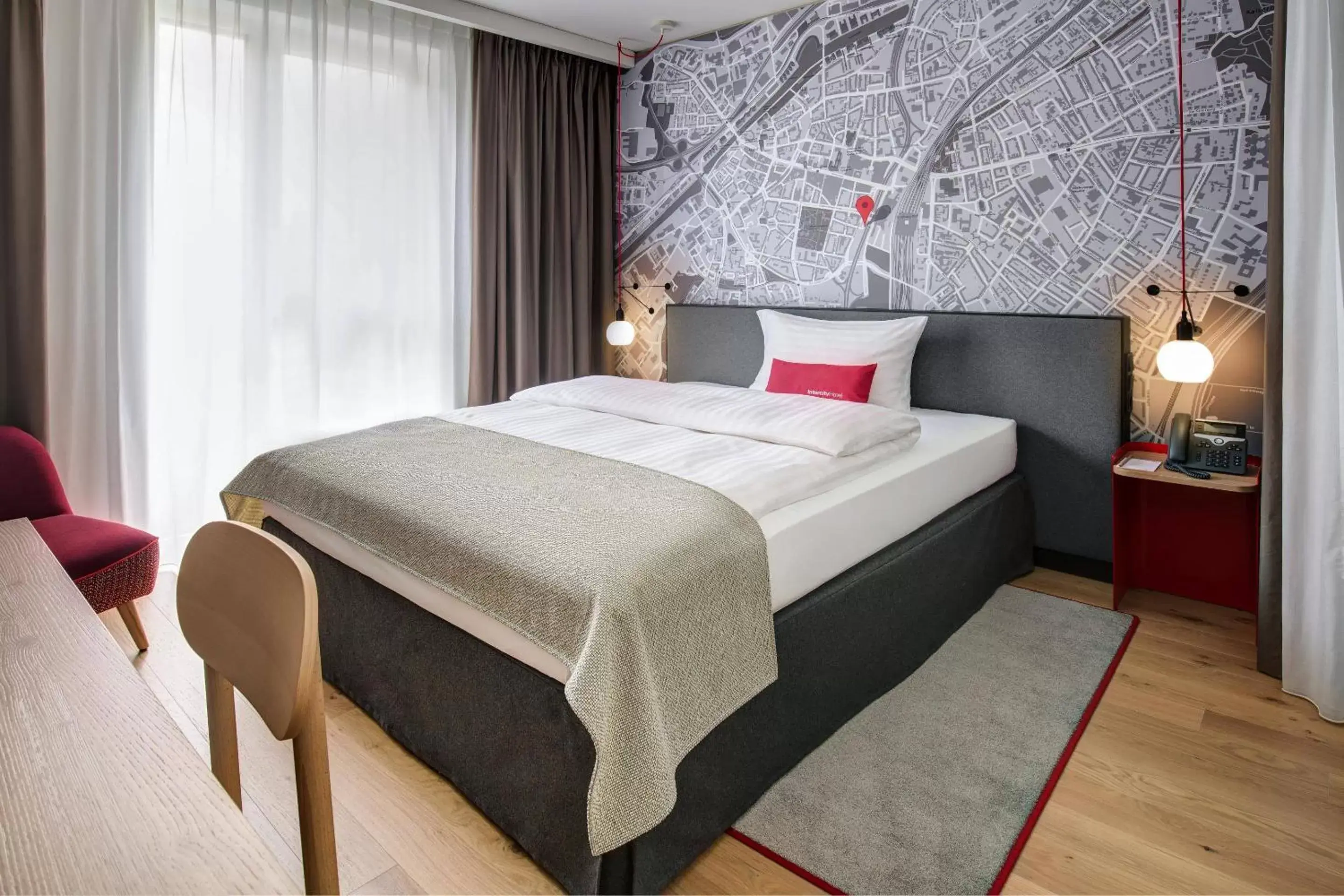 Photo of the whole room, Bed in IntercityHotel Duisburg