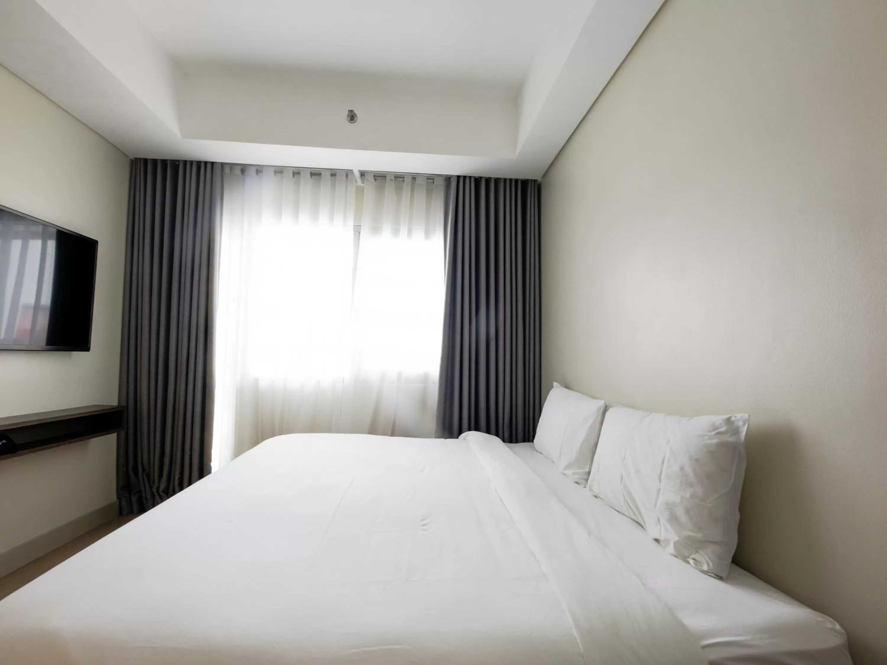 Bedroom, Bed in Capital O 804 The Residences at Bonifacio Civic Center