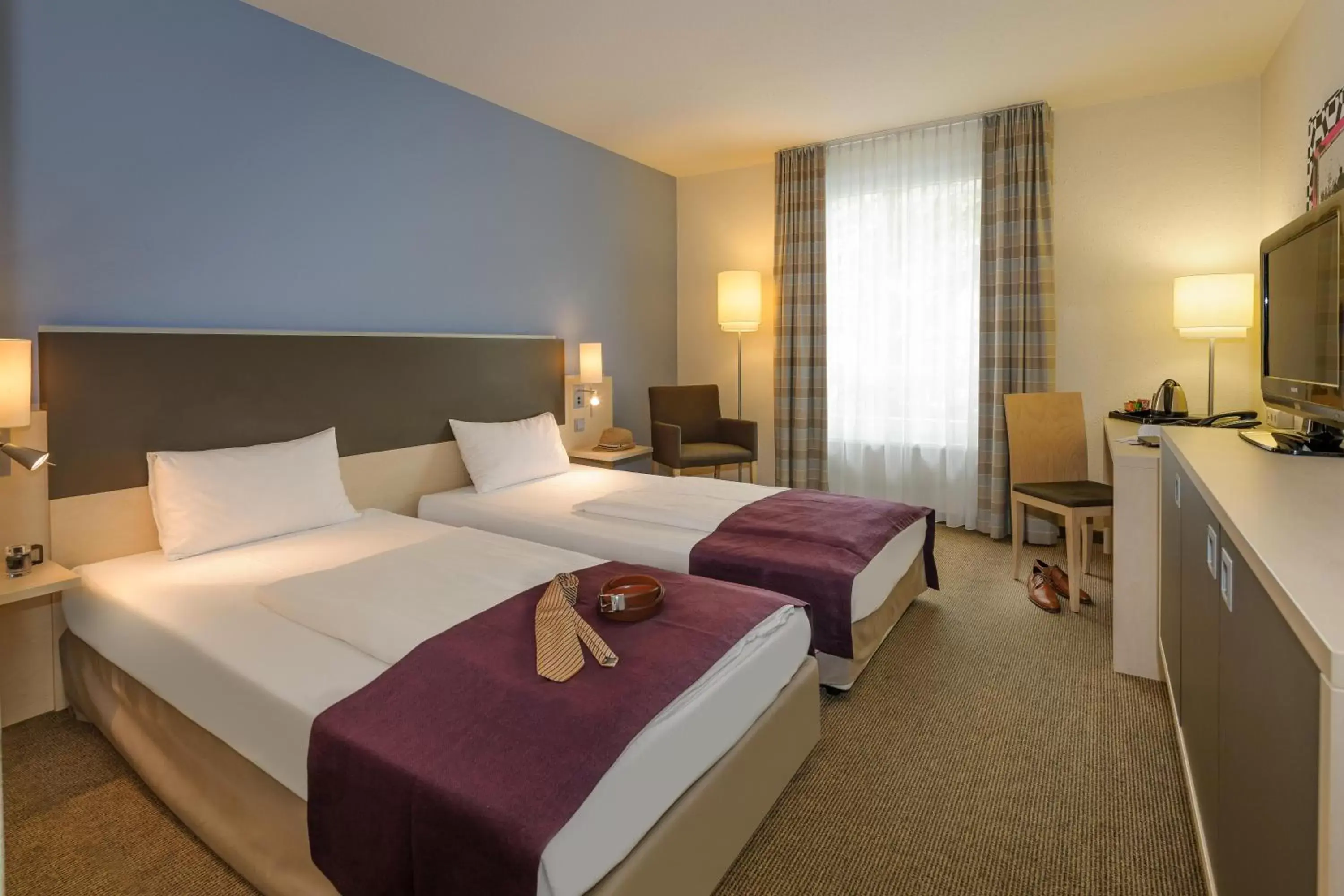 Photo of the whole room, Bed in Mercure Hotel Berlin City West