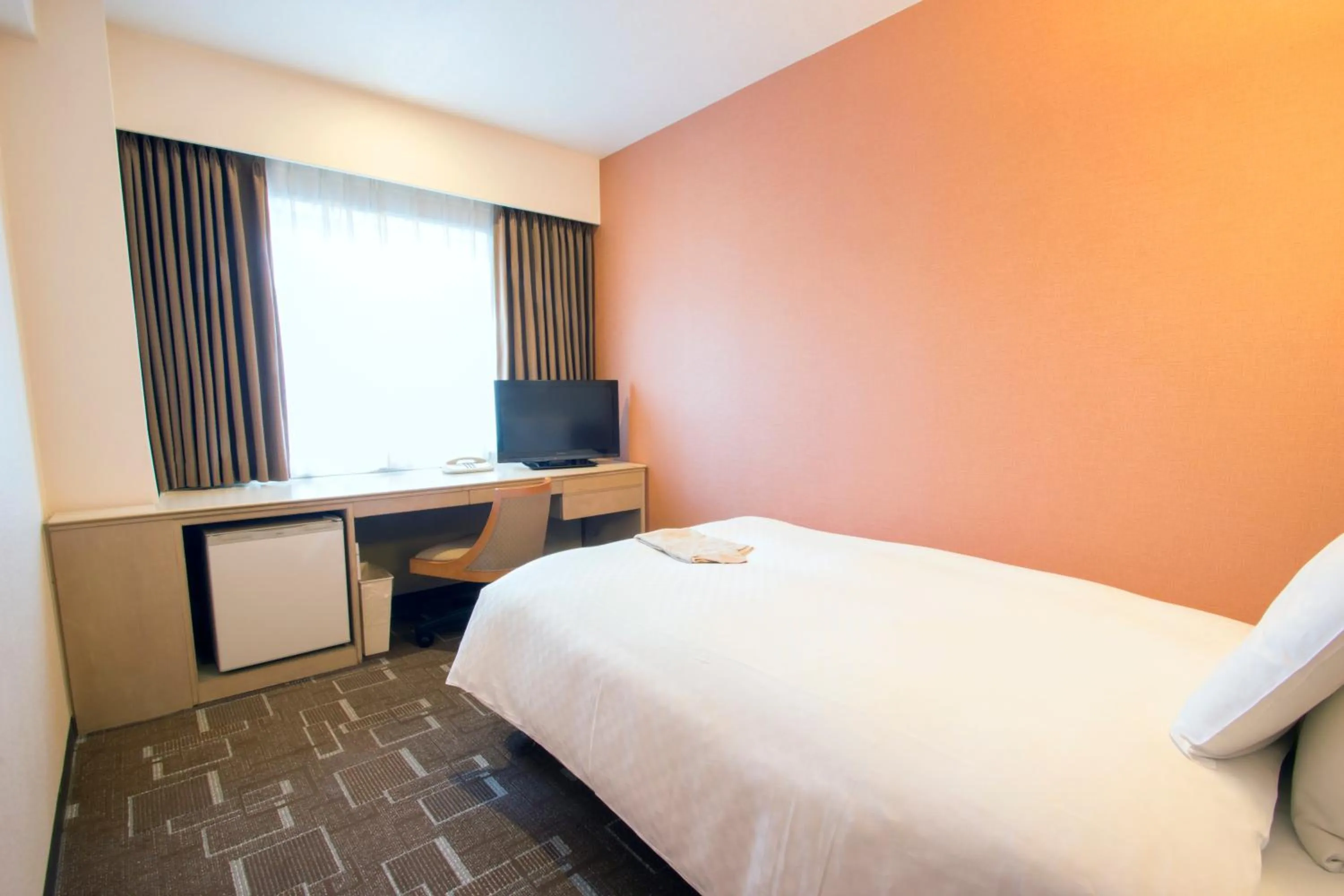 Photo of the whole room, Bed in IP City Hotel Osaka - Imperial Palace Group