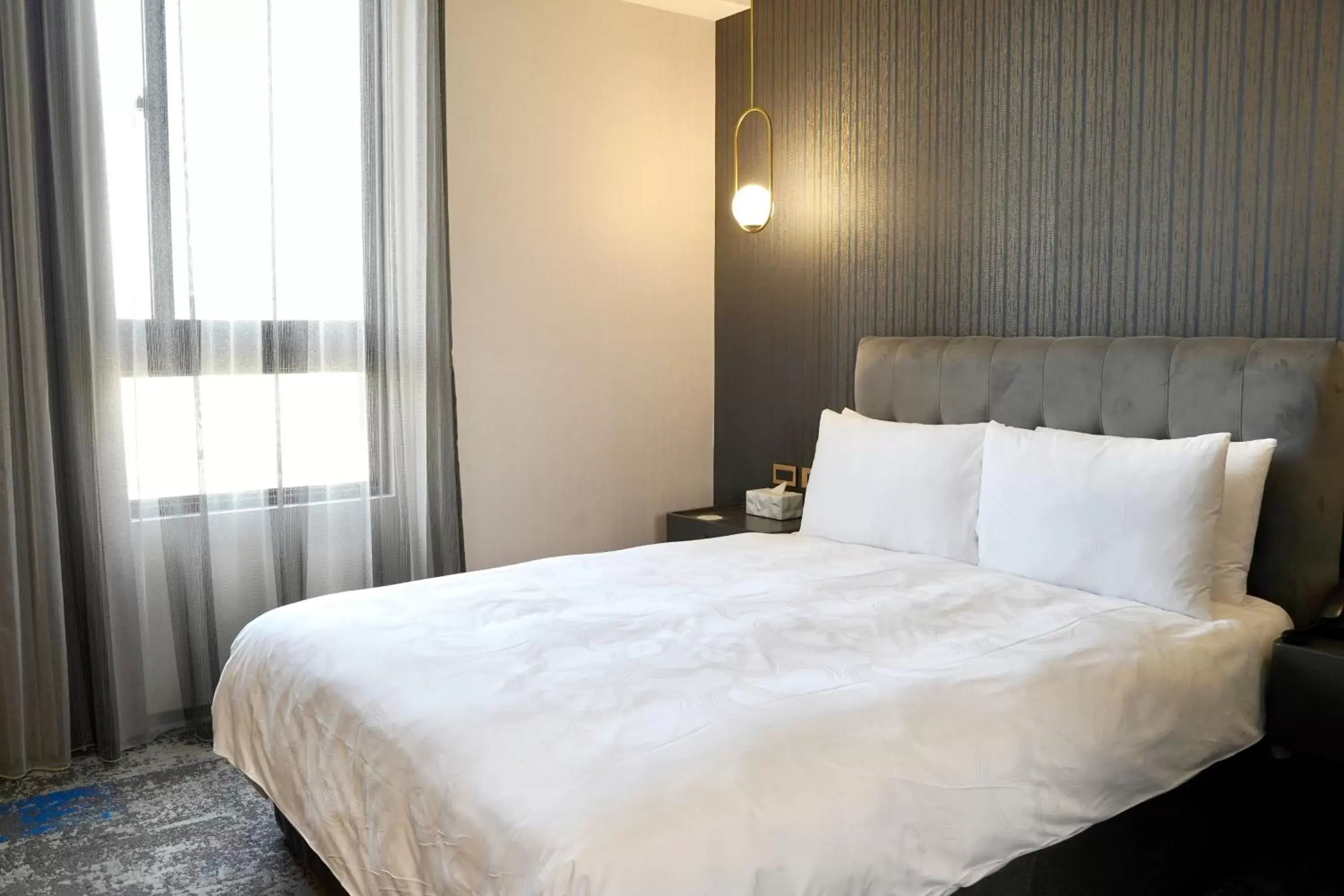 Bed in Tenz Go Hotel Bed in Tenz Go Hotel