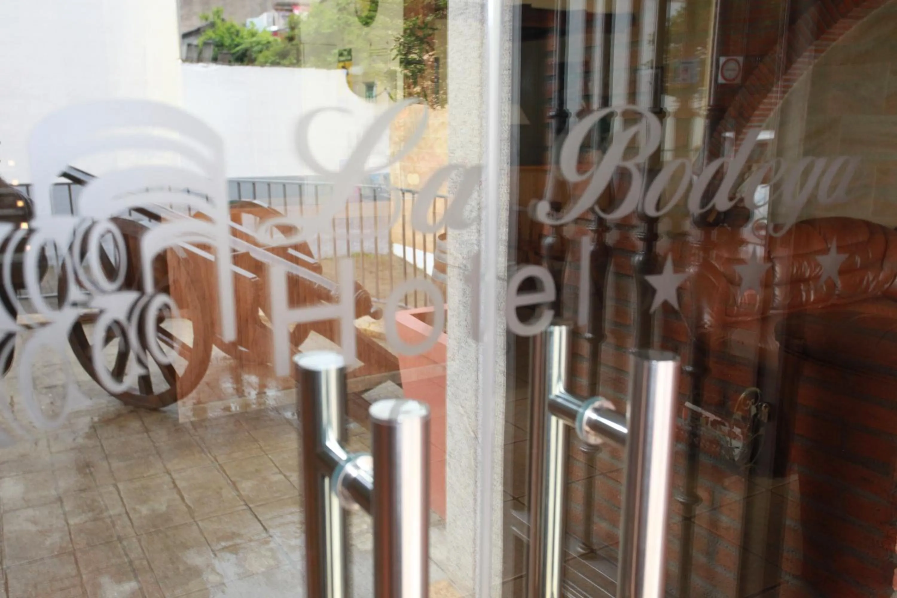 Property logo or sign in Hotel La Bodega