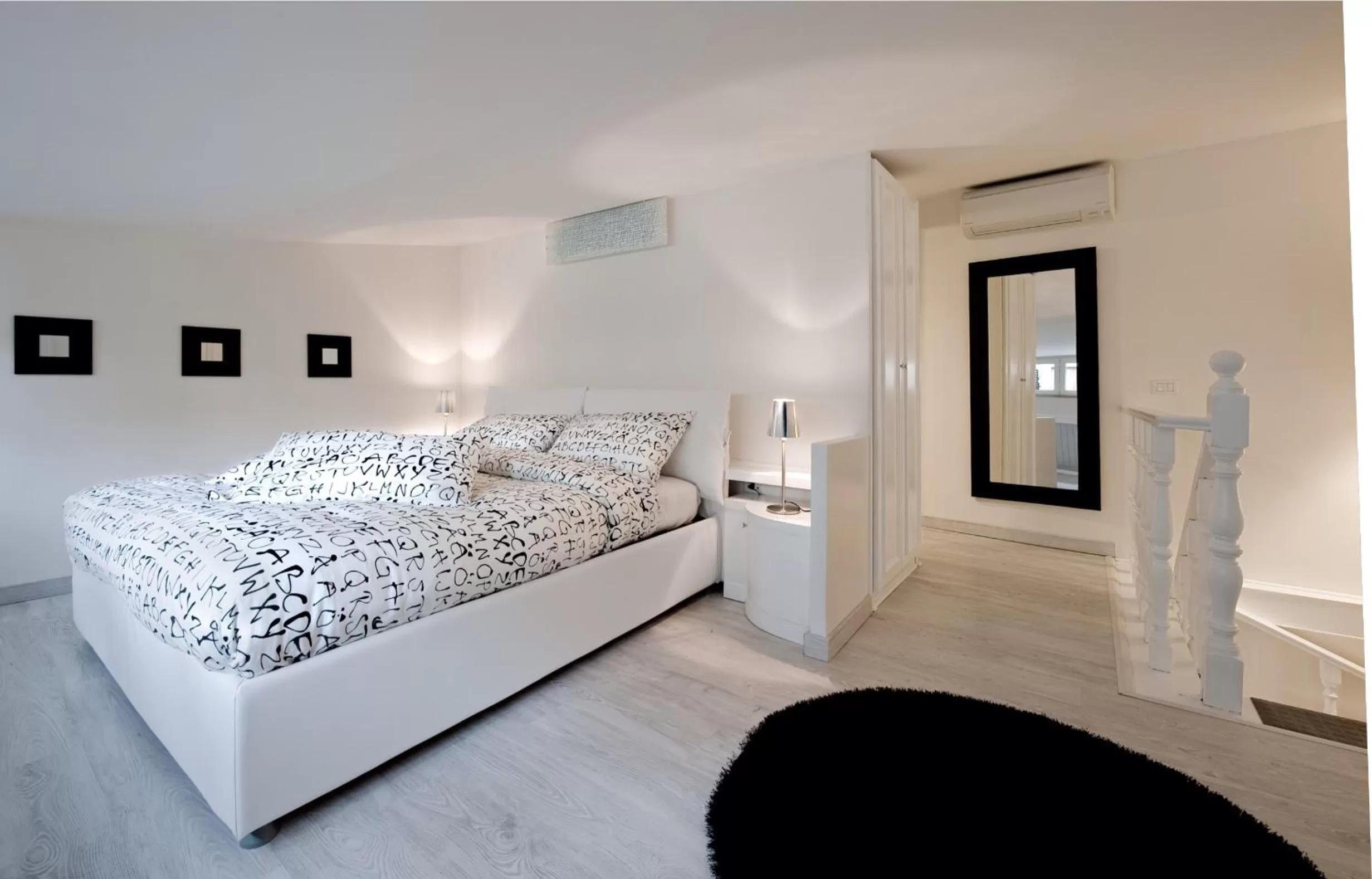 One-Bedroom Apartment - Split Level in Black And White Suite