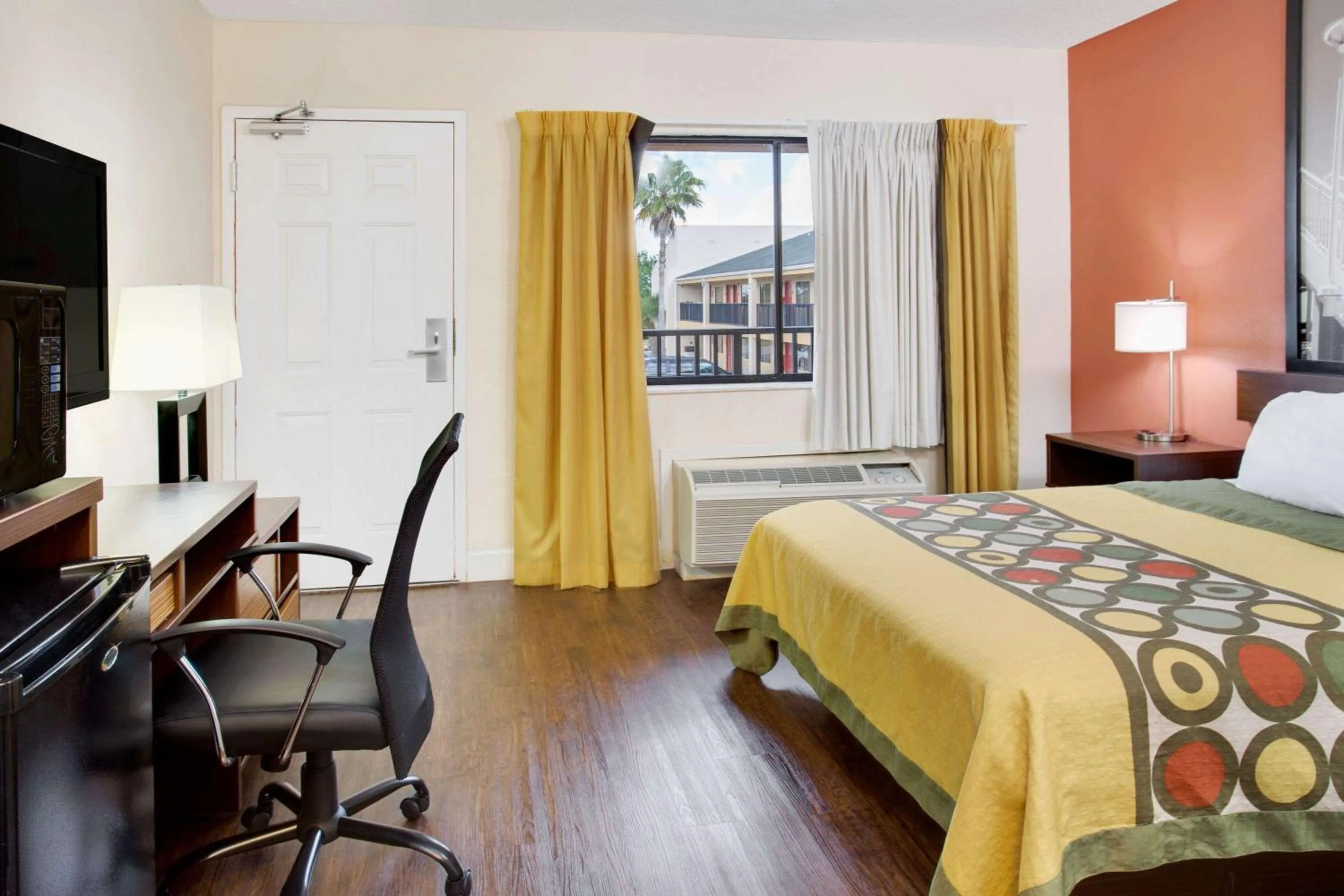 Photo of the whole room, Bed in Super 8 by Wyndham Orlando International Drive