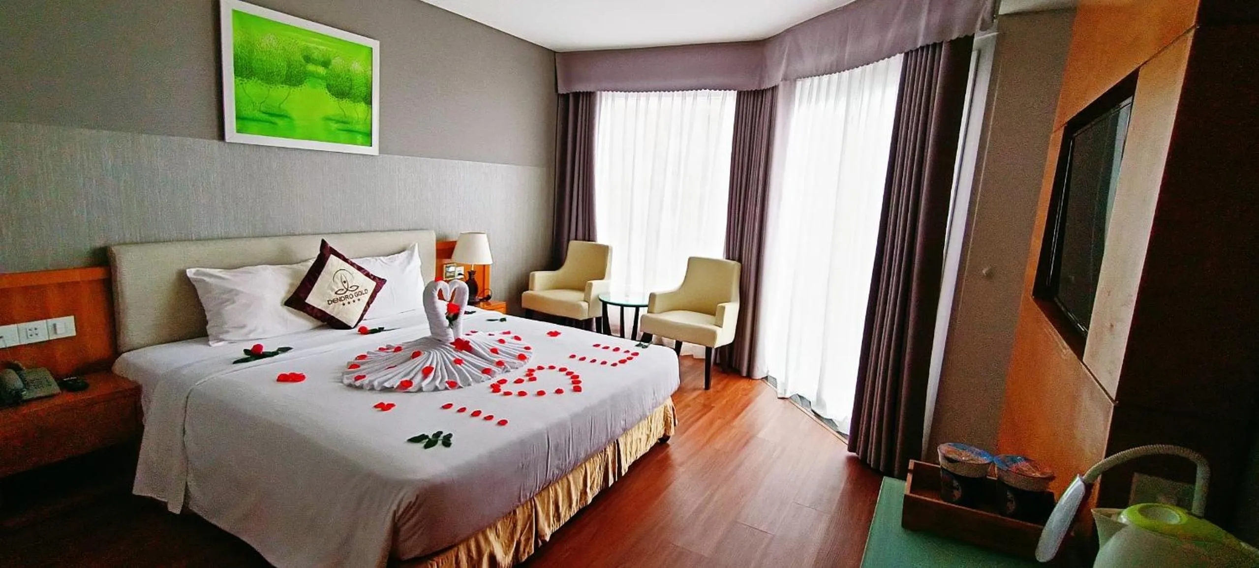 Bed in Dendro Gold Hotel