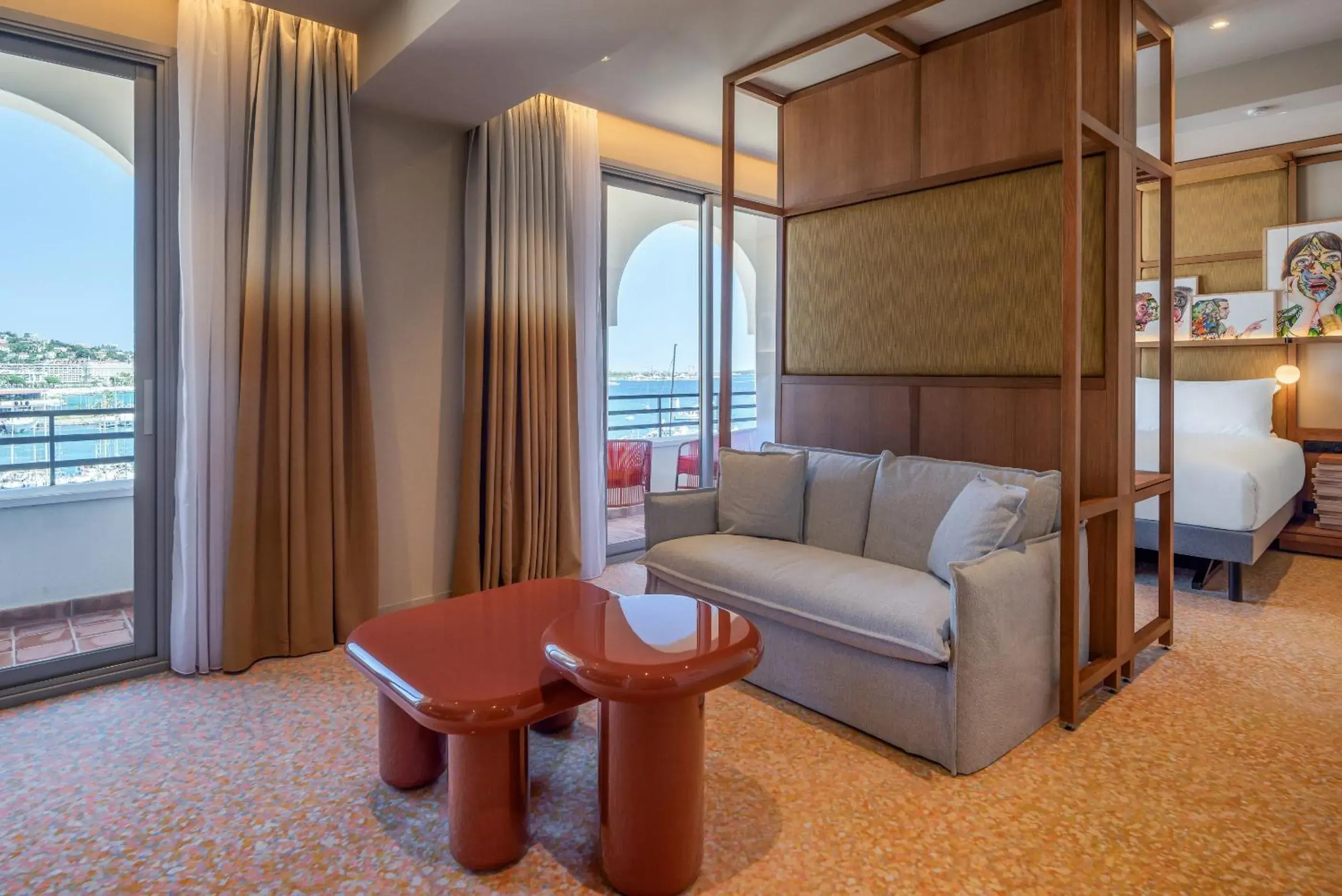 Bed, Seating Area in Canopy by Hilton Cannes