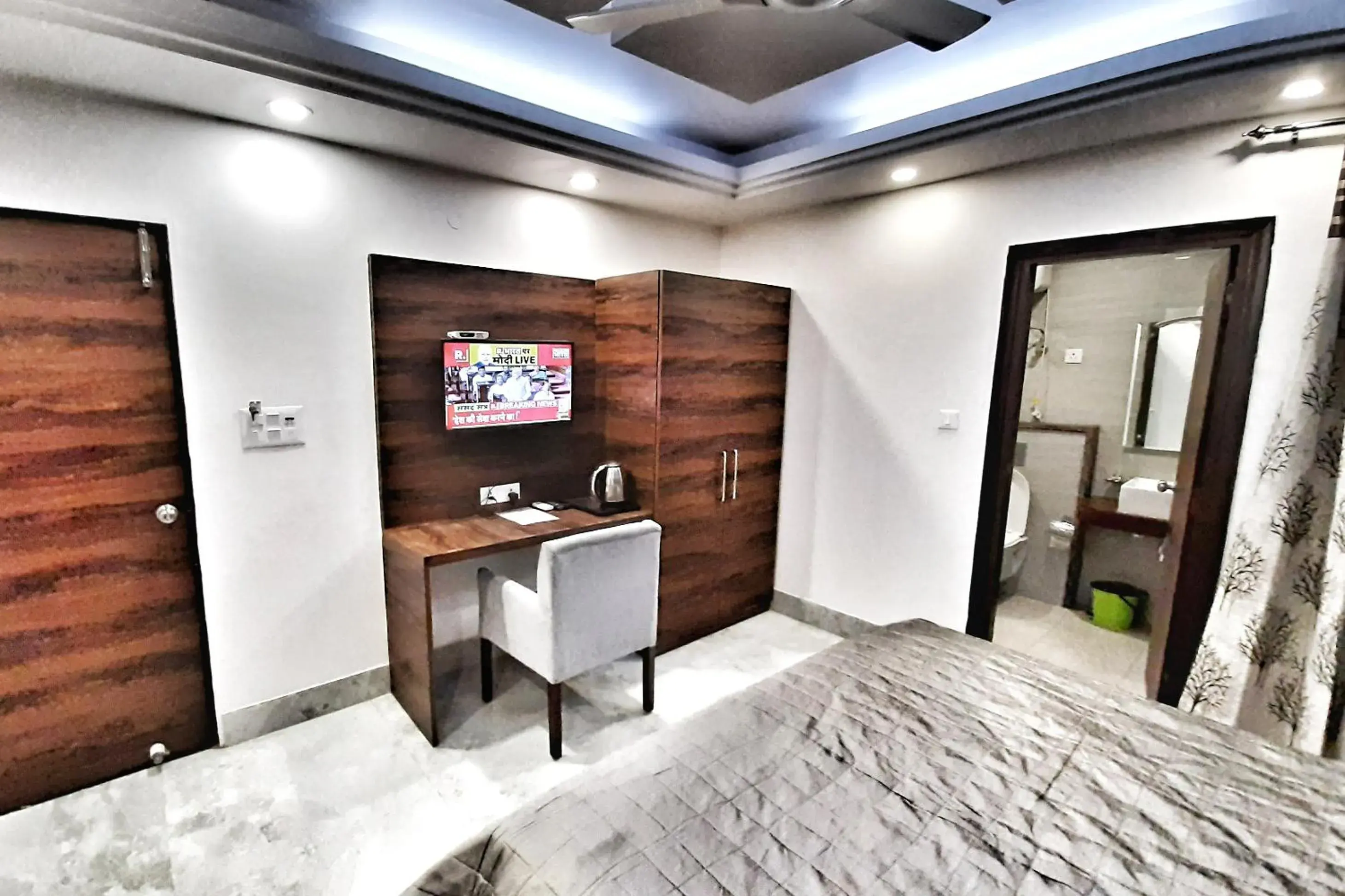 TV and multimedia, TV/Entertainment Center in Hotel Aerocity Purple Orchid