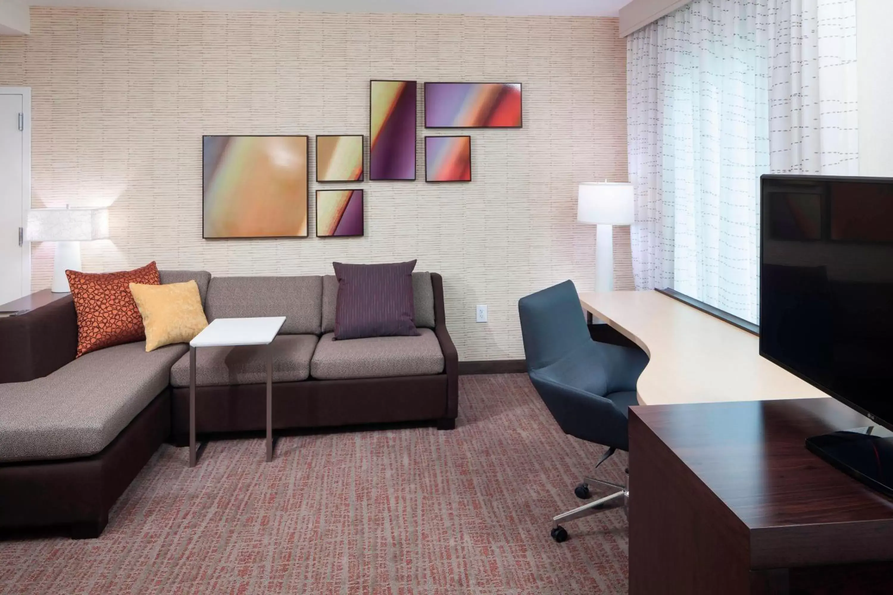 Photo of the whole room, Seating Area in Residence Inn by Marriott Near Universal Orlando