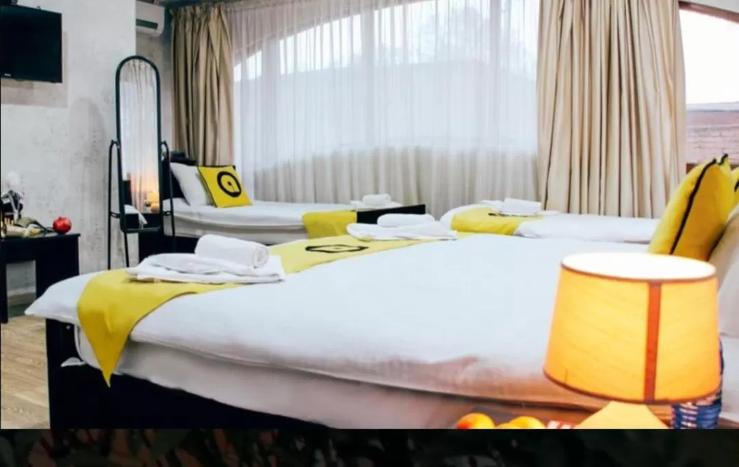 Photo of the whole room, Bed in Aura Plaza Hotel