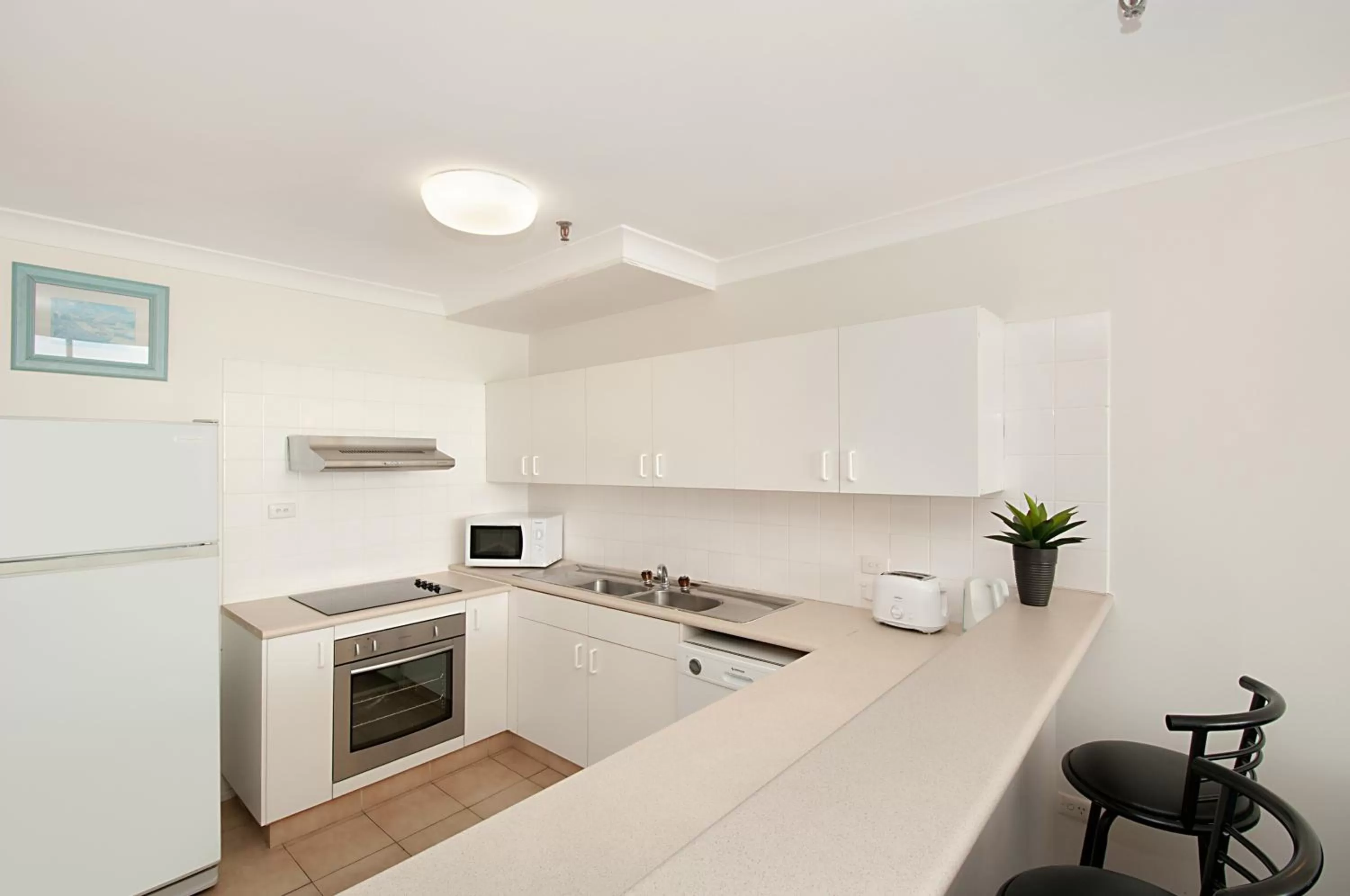 Kitchen or kitchenette in Focus Apartments
