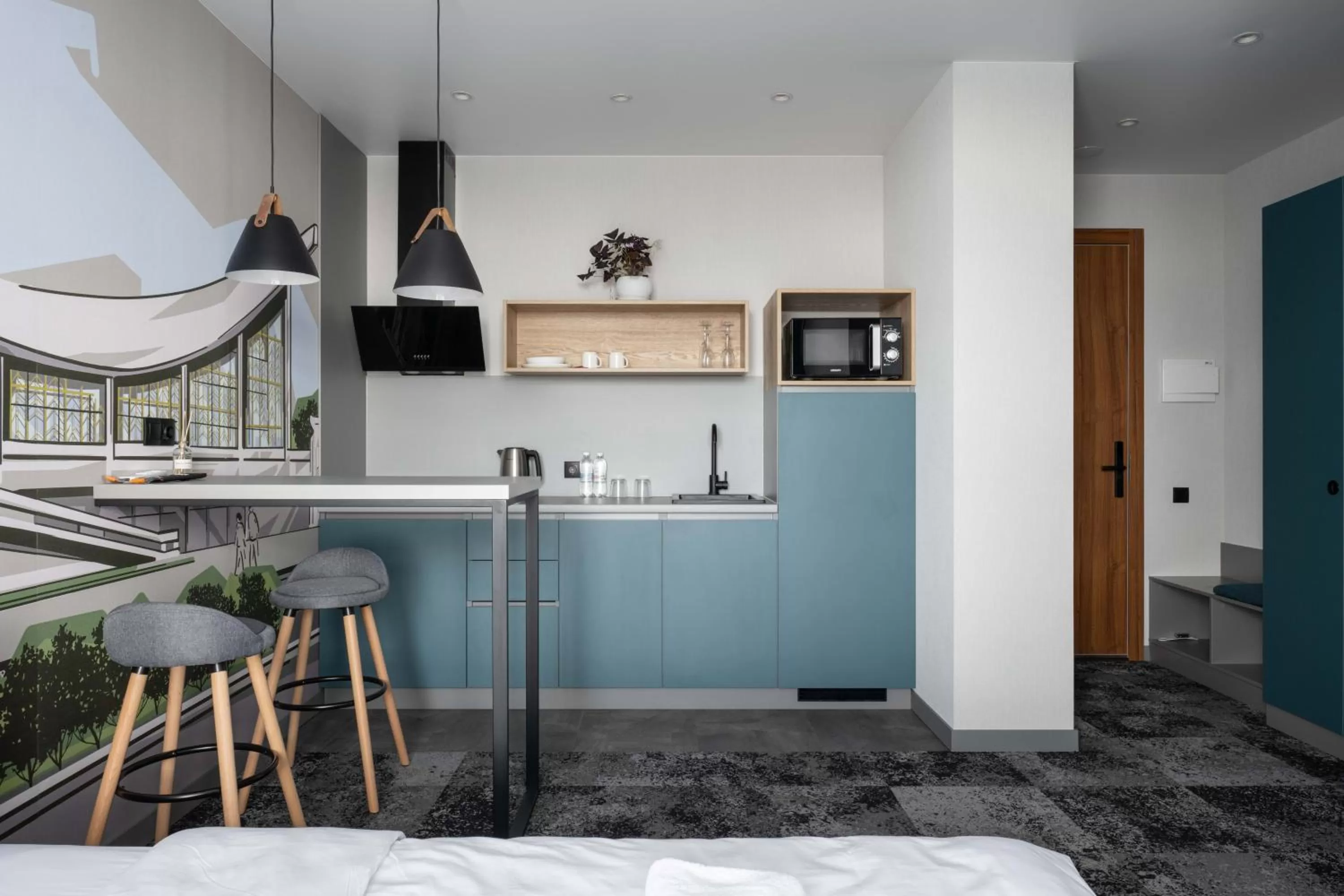 Bed, Kitchen/Kitchenette in Be The One Hotel