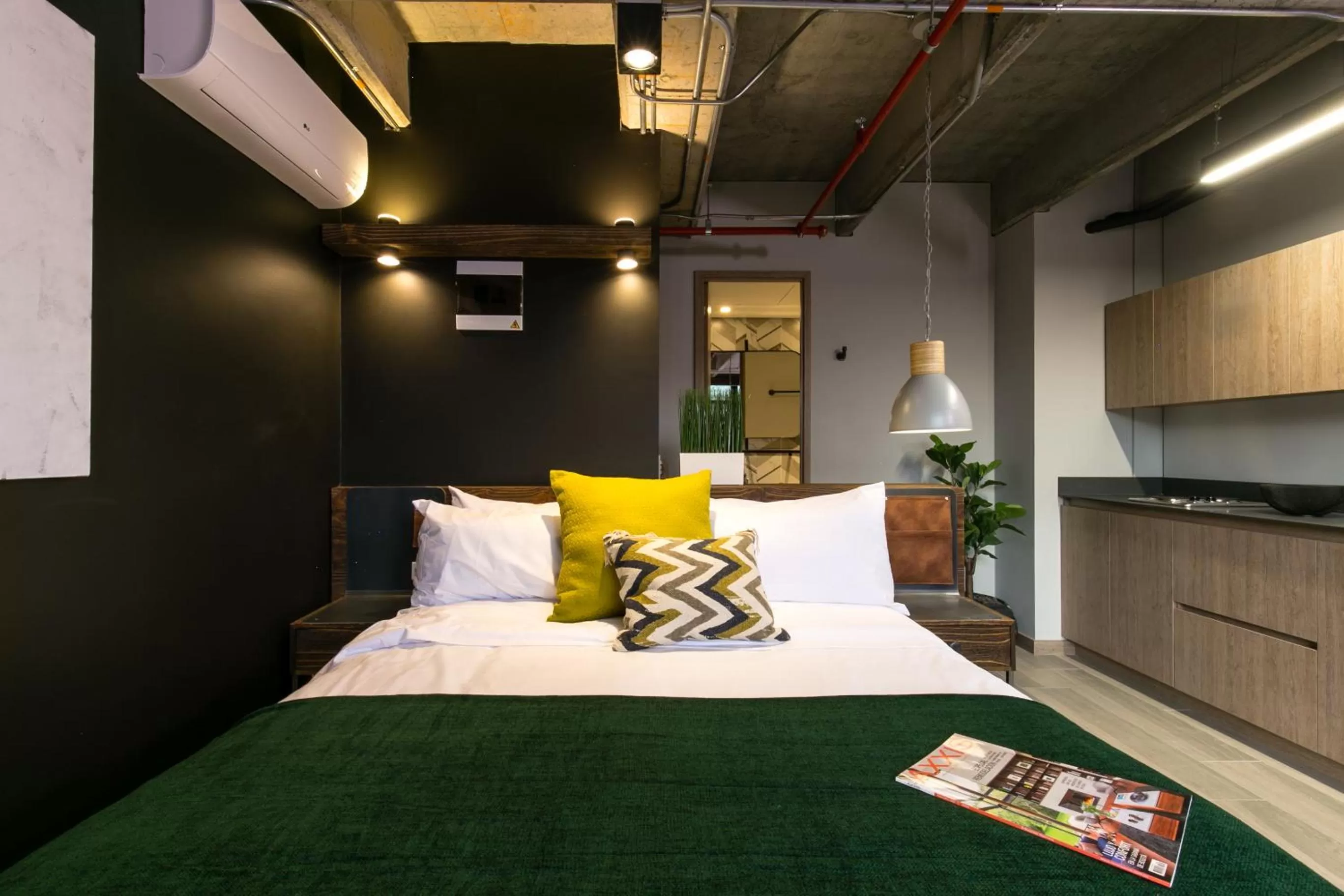 Bed in Factory Lofts Hotel