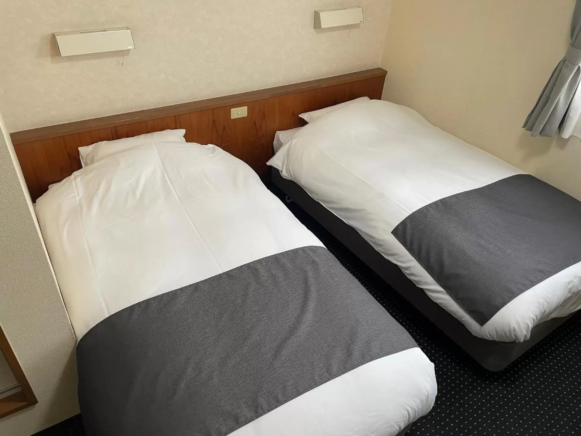 Bed in Atto Business Hotel Ichinoseki