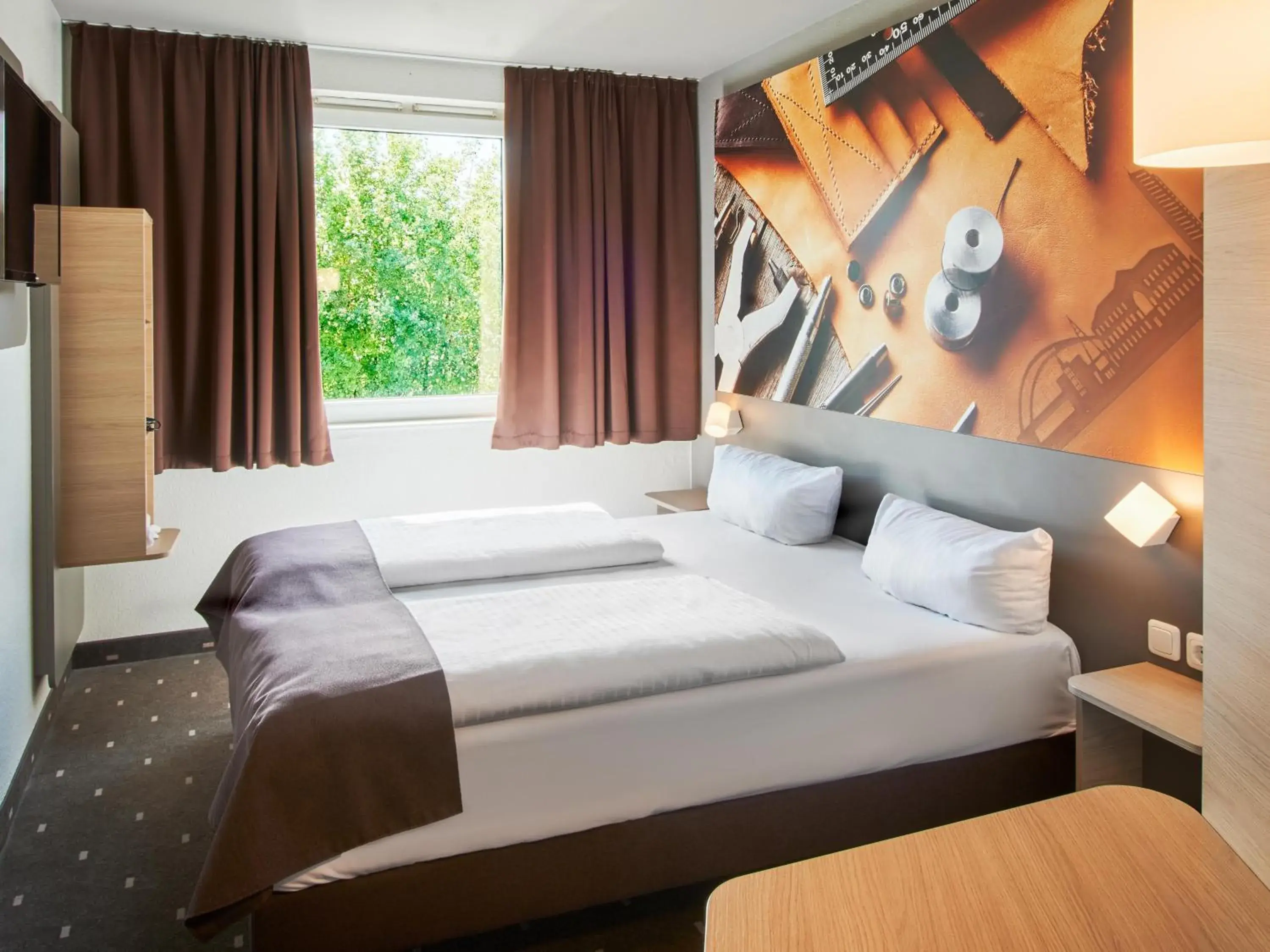 Bed in B&B Hotel Offenbach-Süd Bed in B&B Hotel Offenbach-Süd