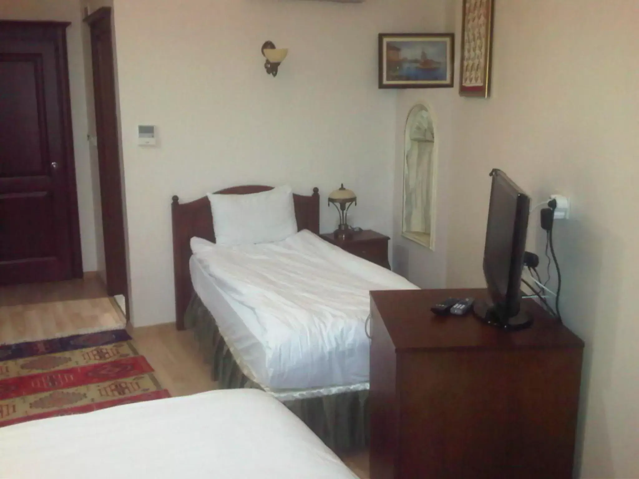 TV and multimedia, Bed in Basileus Hotel