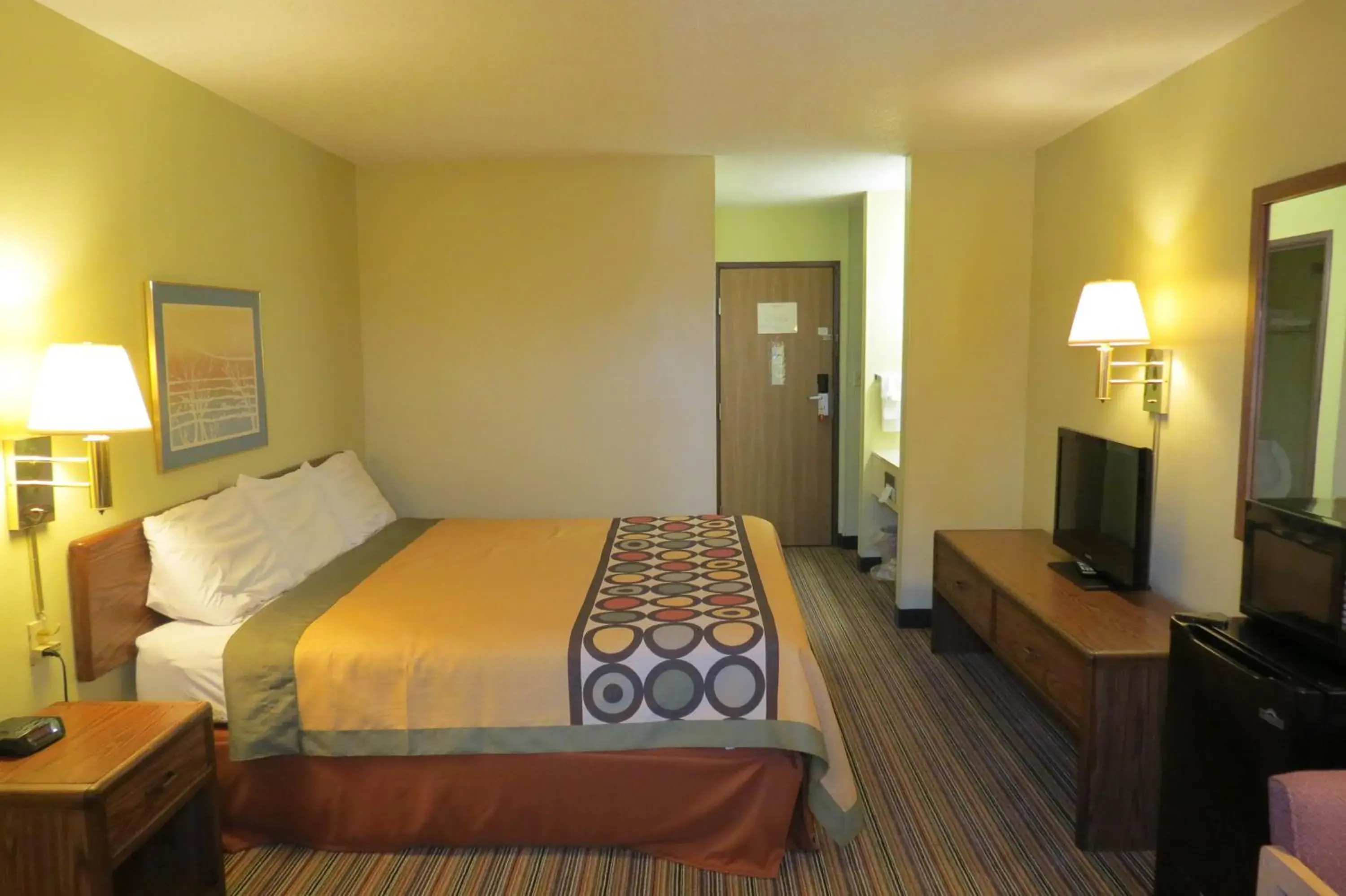 Bed in Super 8 by Wyndham Evansville East